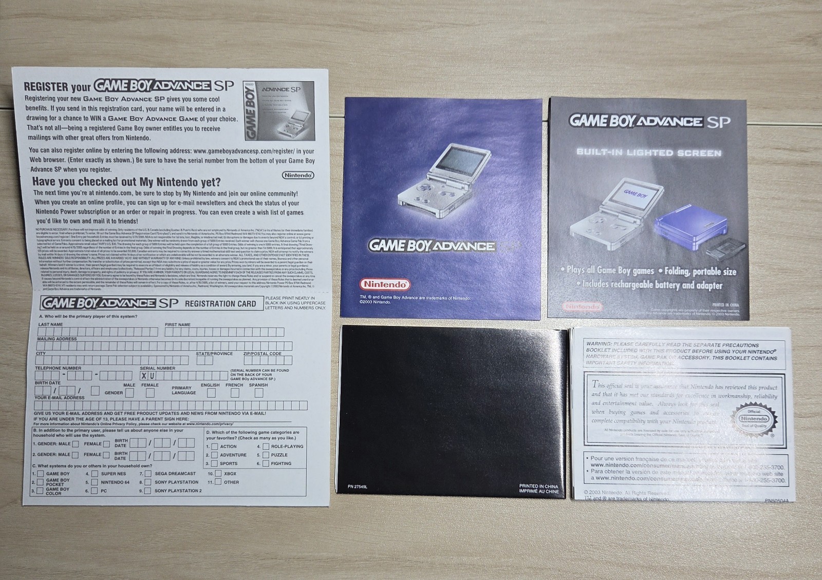 Platinum Nintendo Game Boy Advance SP (AGS-001) CIB with Pokémon Leaf Green