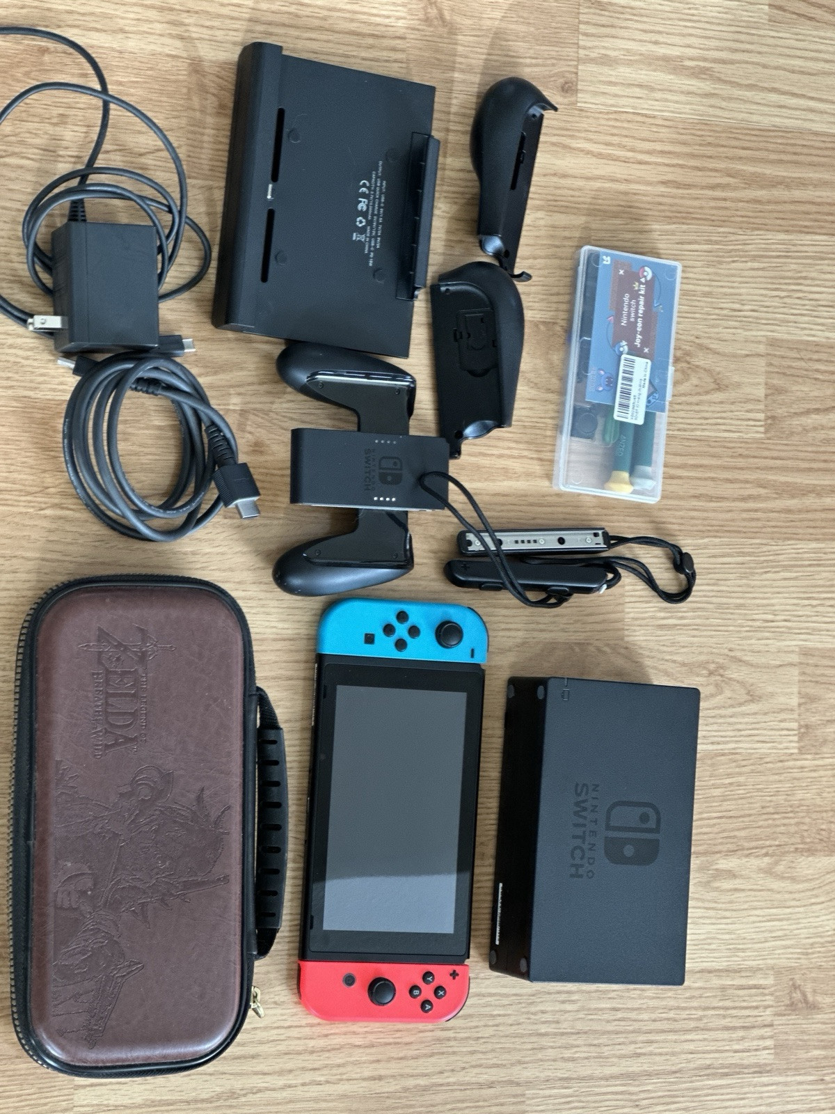 Nintendo Switch HAC-001(-01) with Blue and Red Joy-Con Controllers and Mario…