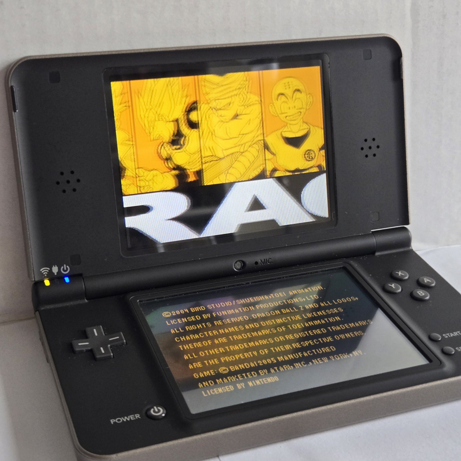 Nintendo DSi XL Bronze/Black Handheld Console Wi-Fi UTL-001 NTSC-U/C