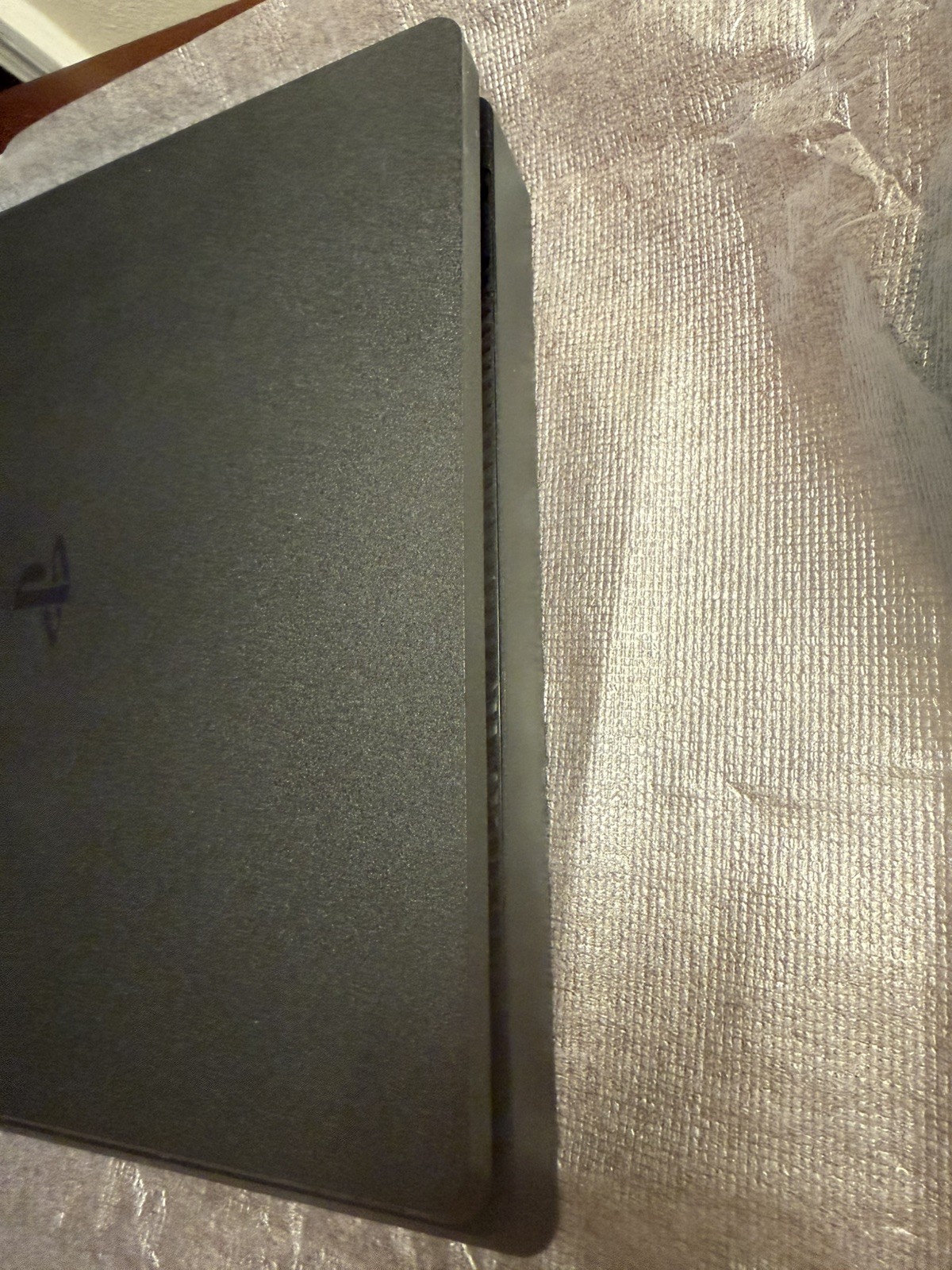 Sony PlayStation 4 Slim Jet Black, 500GB with 2 controllers (1 older model).