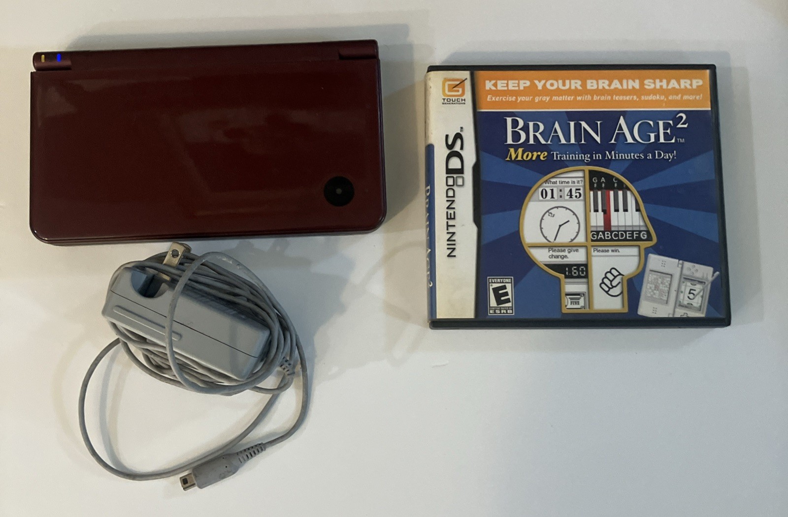 Nintendo DSI XL Handheld console+ Video game brain age 2 + charger red color