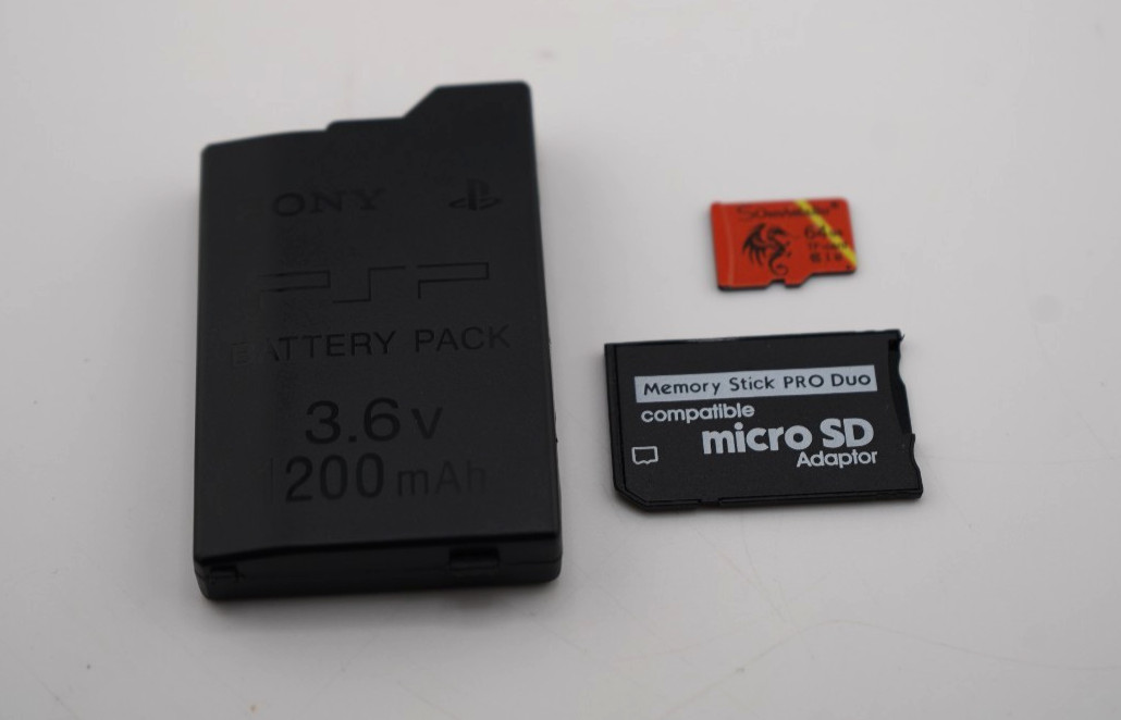 Sony PSP-3000 Console with OEM Battery, Game, 64GB SD, Case Bundle – Piano Black