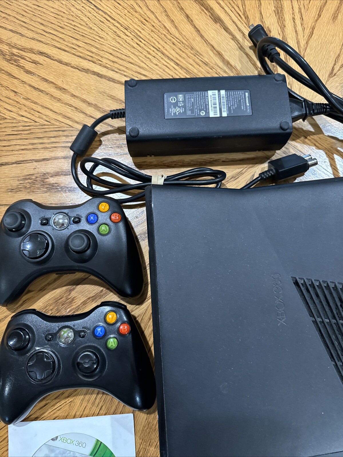 Microsoft XBOX 360S with 2 Controllers 1 Game Madden 25 HDMI Cord and Power Cord