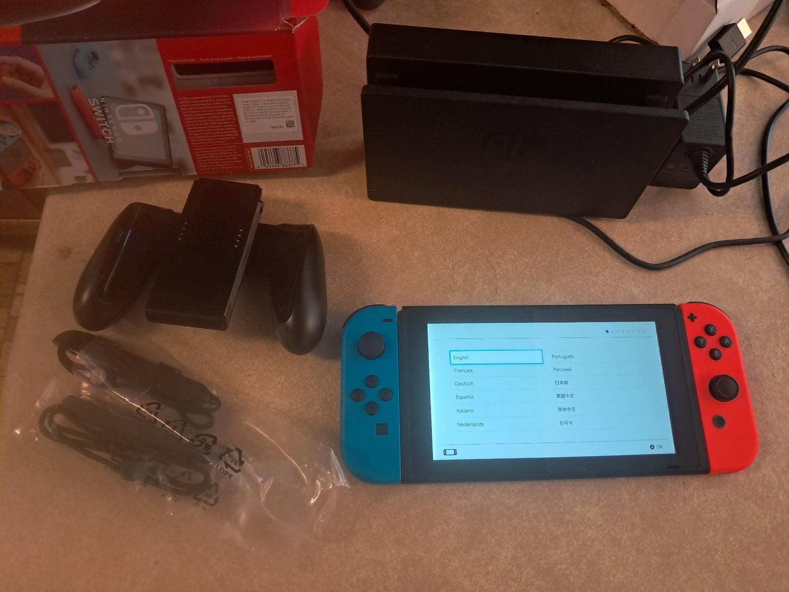 Nintendo Switch 32GB Handheld Console Red/Blue (hac 001-01) with pro controller