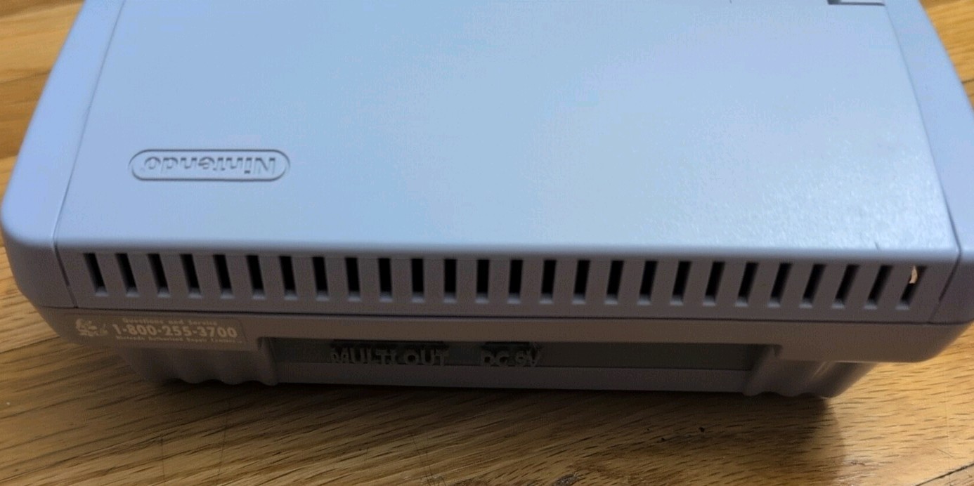 Nintendo SNES 512MB Grey Console SNS-101. W/ power , AV hook up and control.