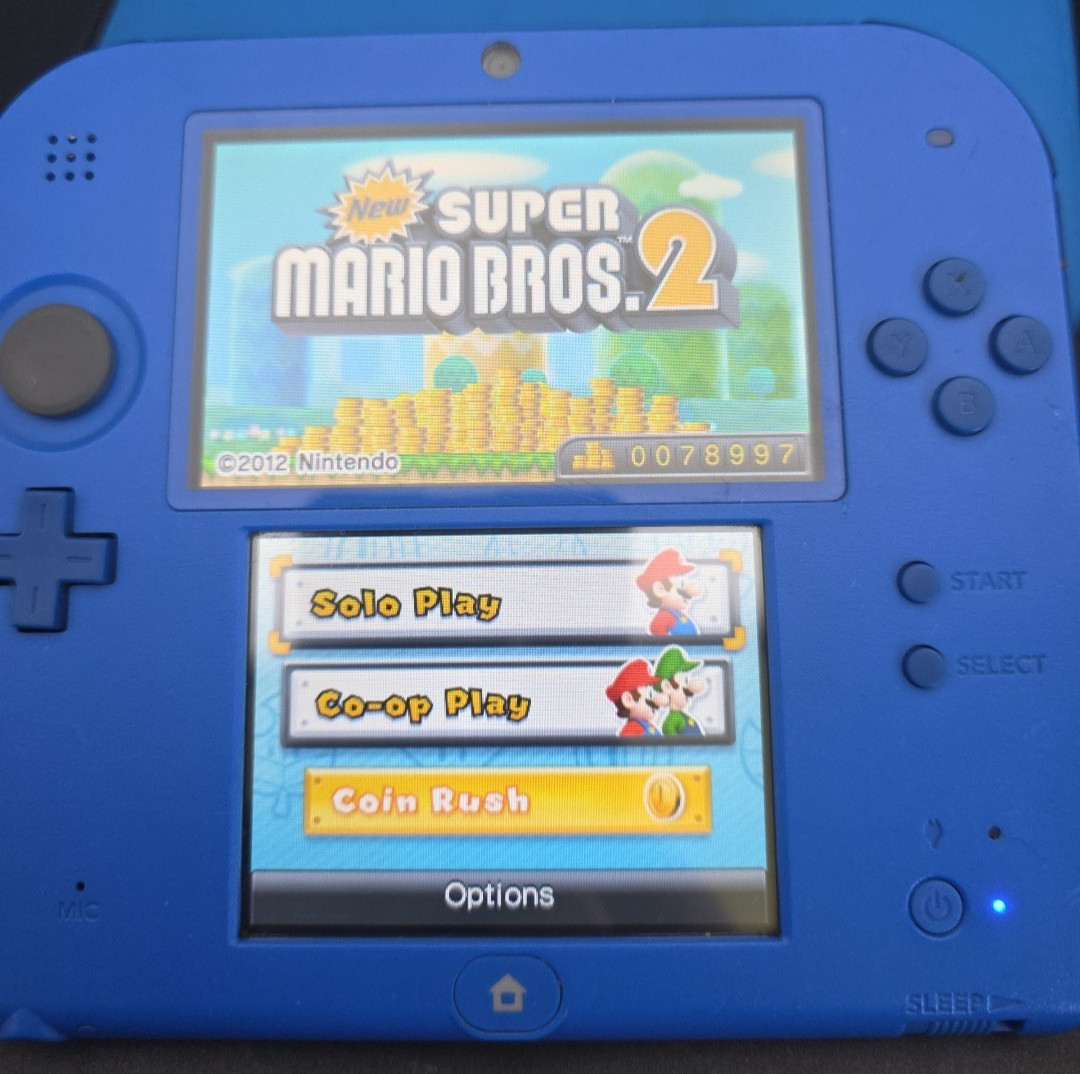 Nintendo 2DS Red Black Handheld System Wi-Fi with Charger, Case And Mario 2