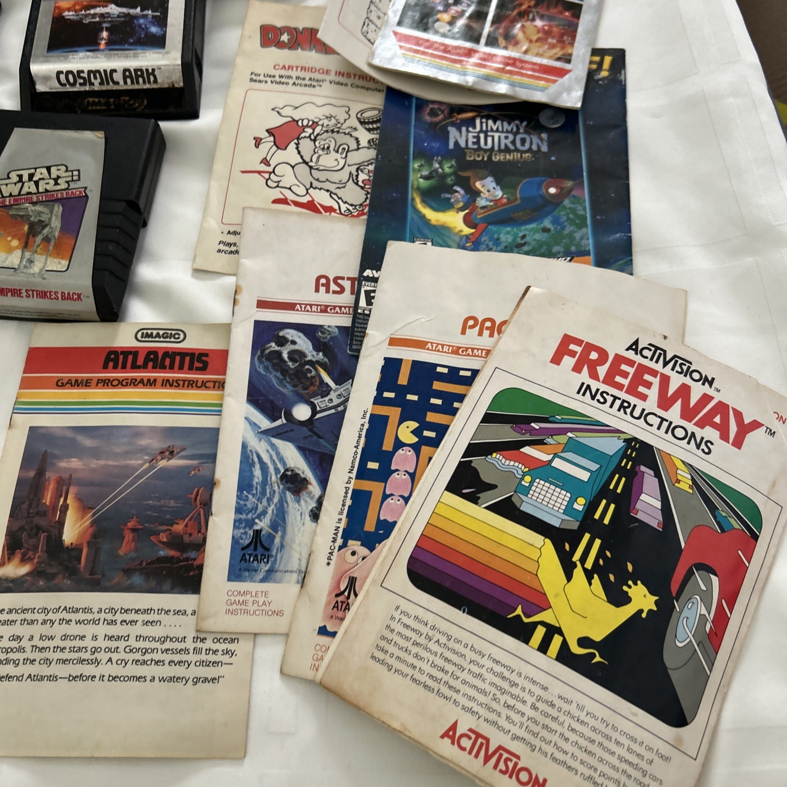 Atari 2600 JR Rainbow Console w/ Paddles, 48 Games & Some Manuals