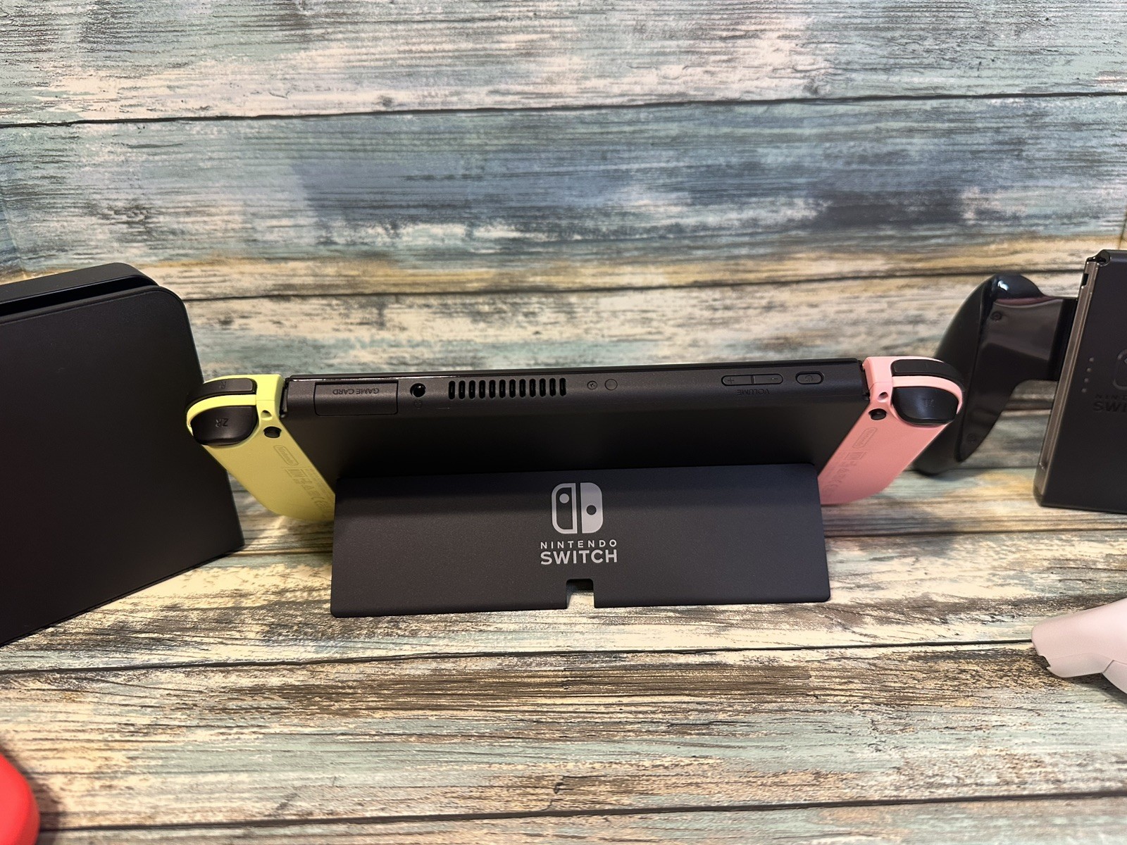 Nintendo Switch OLED Model w/ Neon Red & Neon Blue JoyCon Console + 2 JoyCons