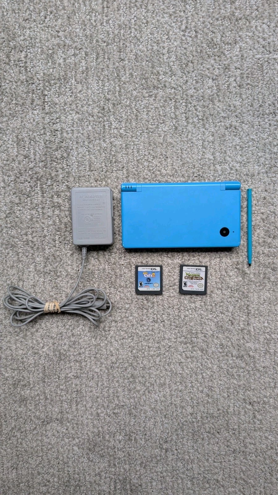 Nintendo DSi Light Blue Handheld Console Game System w/ Charger & 2 Games