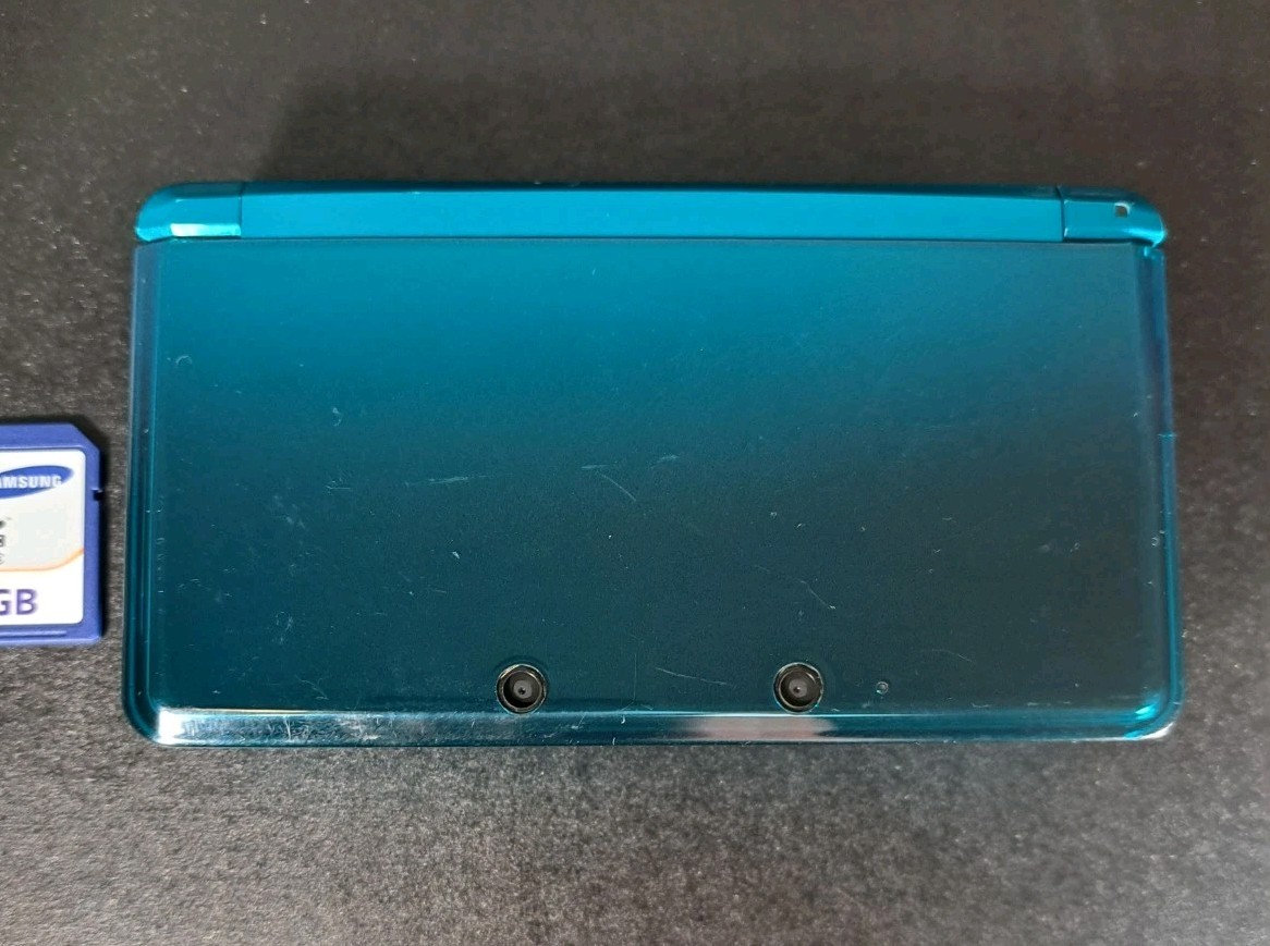 Nintendo 3DS Aqua Blue Handheld Console 3D Technology w/ Nyko Powerpak & 4GB SD