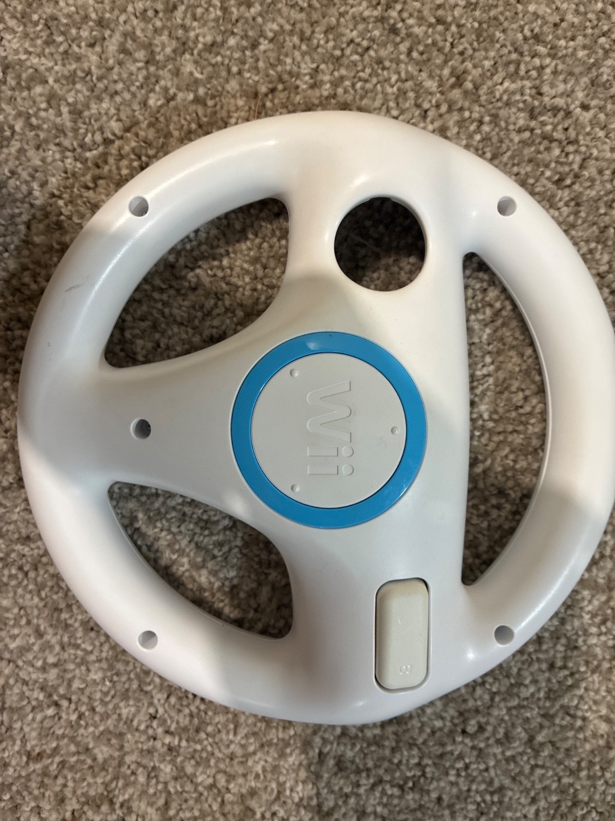 Nintendo Wii console, three controllers, four nunchucks, Wii steering wheel