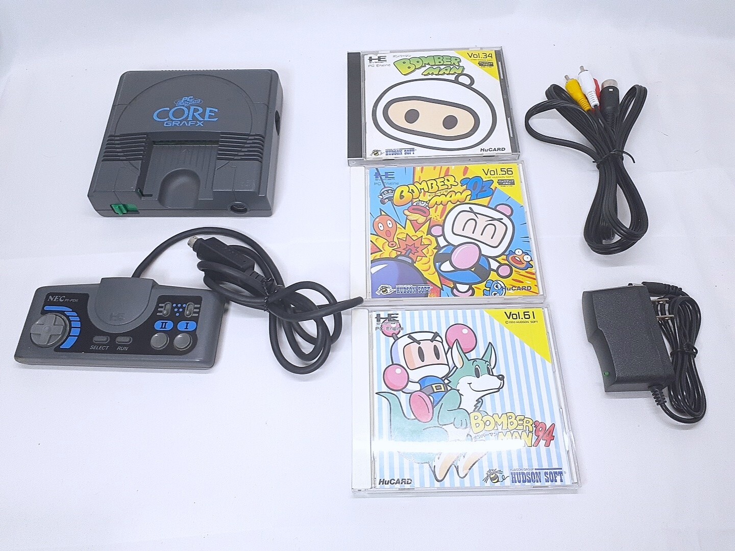 PC Engine CORE GRAFX console + Bomberman, ’93, ’94 Case game set NTSC-J Tested