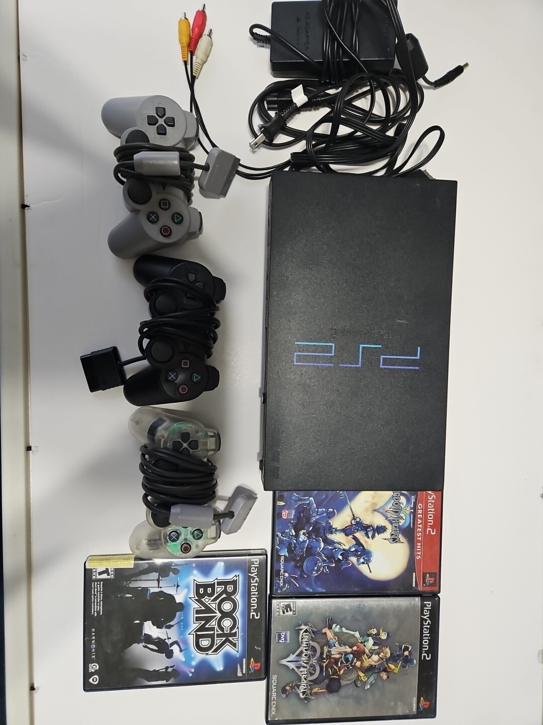 PS2 Bundle. Three Controllers, Three Games, And A Memory Card 128mb.