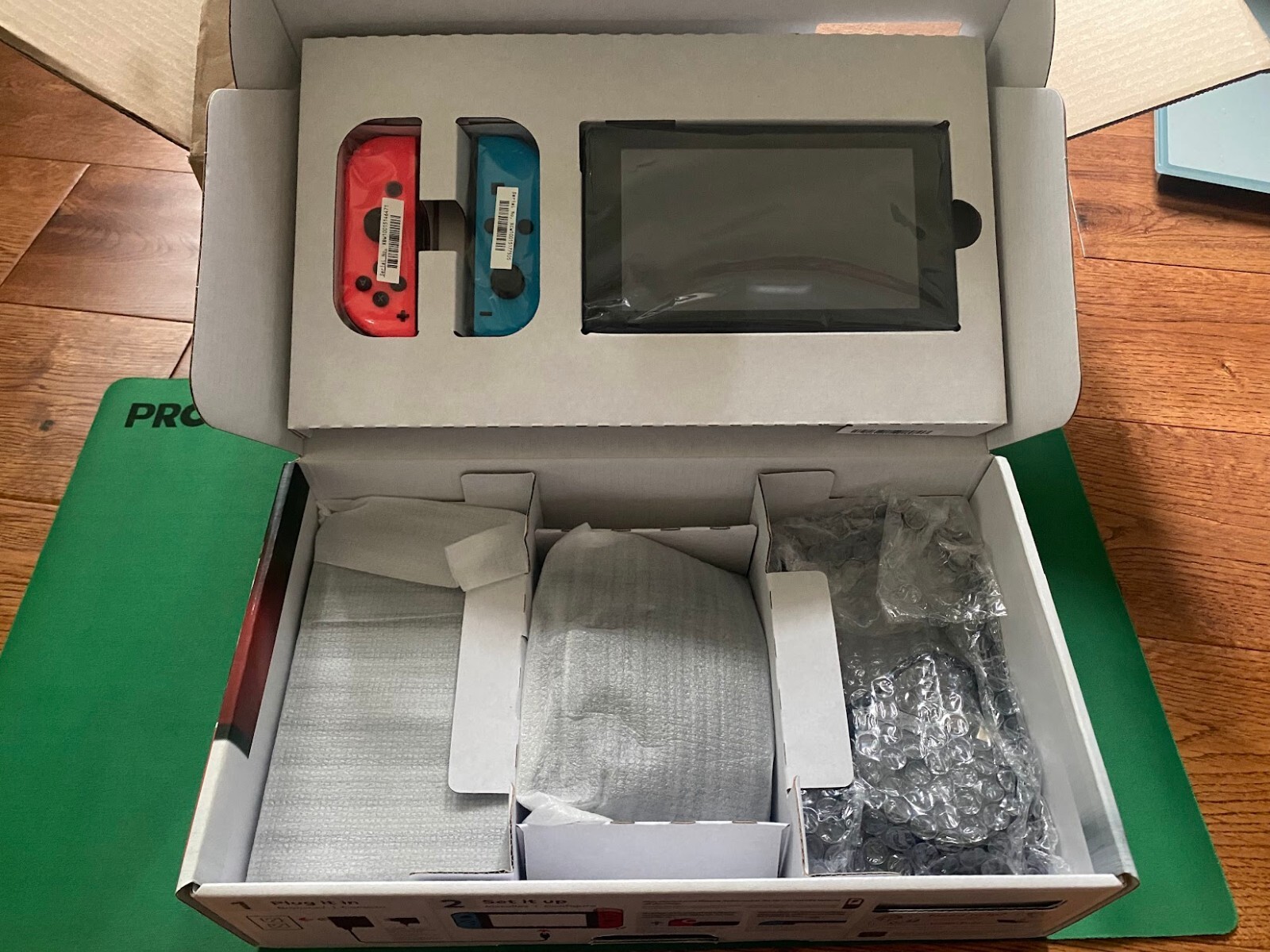 Nintendo Switch 32GB Handheld Console – Neon Red/Neon Blue HAC-001 + 1tb MicroSD