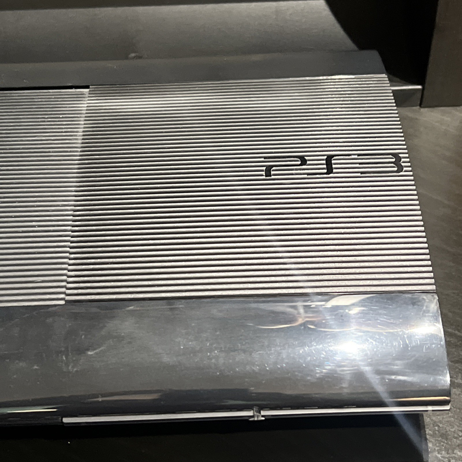 Sony PlayStation 3 – Super Slim Launch Edition 12GB Video Game Console Charcoal