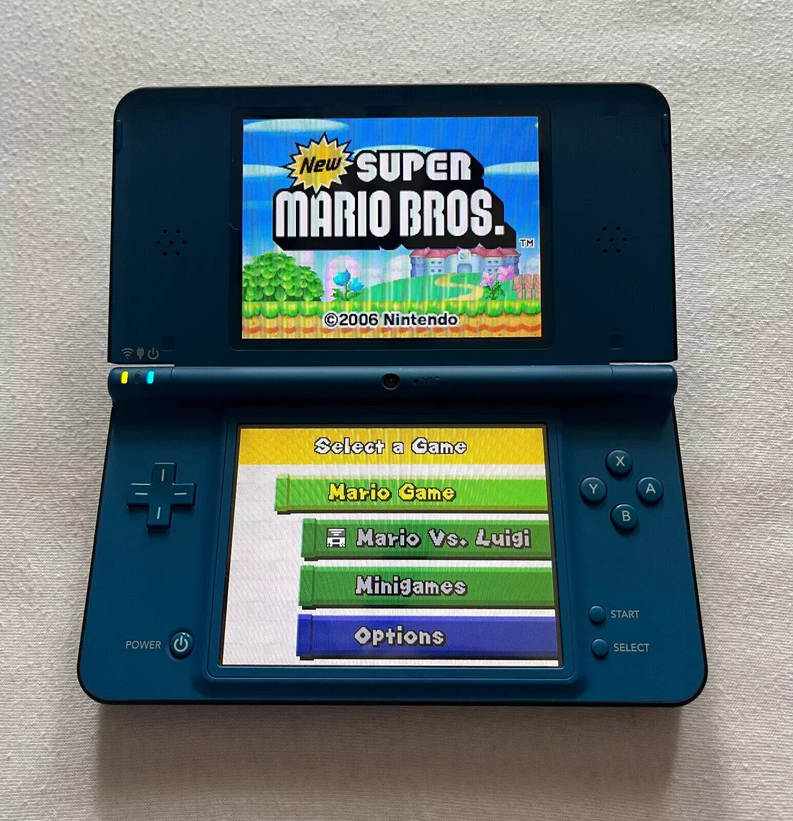 Nintendo DSi XL Midnight Blue Charger MARIO KART – MARIO PARTY – SUPER MARIO A+