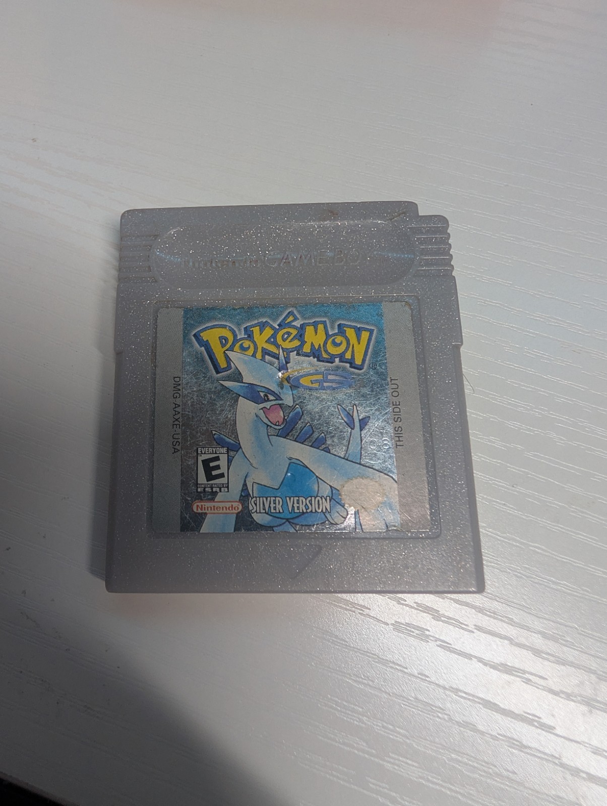 Analogue Pocket Handheld – Transparent Orange Limited Edition w/ pokemon silver