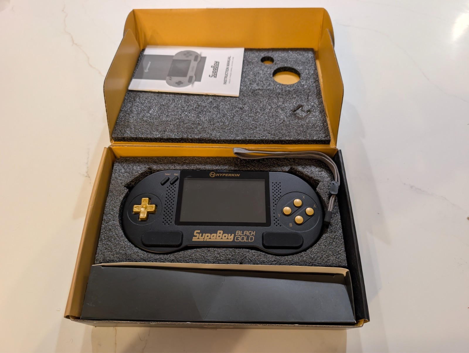Used Hyperkin SupaBoy Portable Pocket BlackGold Console (Box & Manual Included)