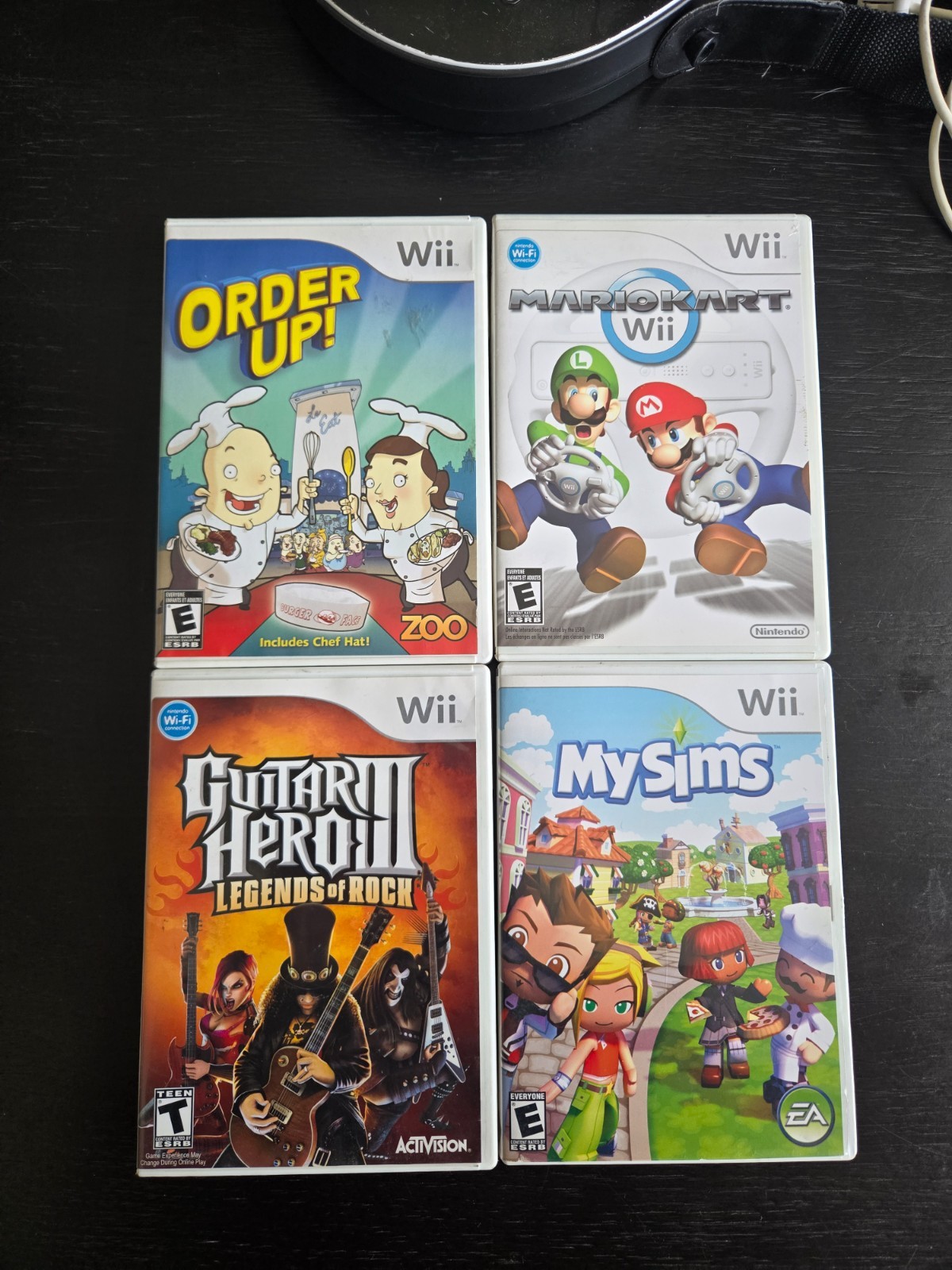 Nintendo Wii Console Bundle – 3 remotes, 9 games