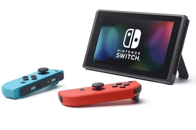 EUC! Nintendo Switch Bundle with stand, charger, BONUS extra controller.