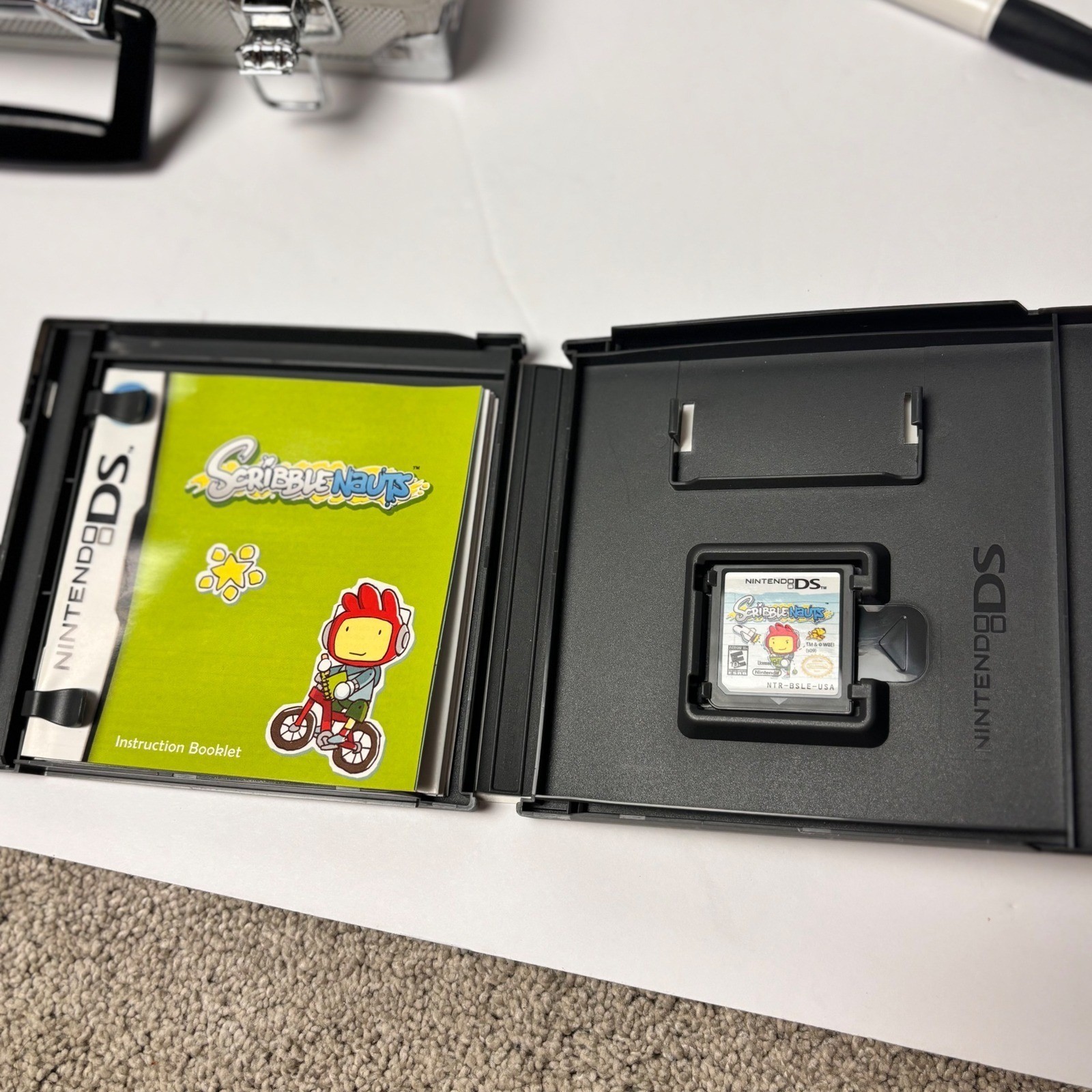 Nintendo DS Silver Handheld Console with Intec Aluminum Case Accessories & games