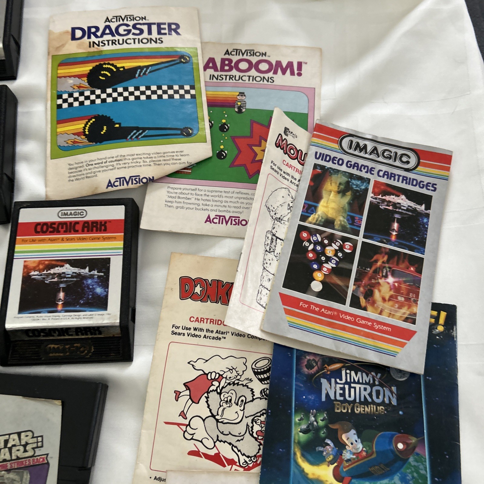 Atari 2600 JR Rainbow Console w/ Paddles, 48 Games & Some Manuals