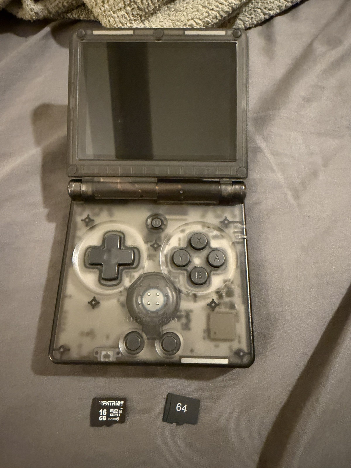 Anbernic RG35XX SP Transparent Black – Used with 64GB SD card