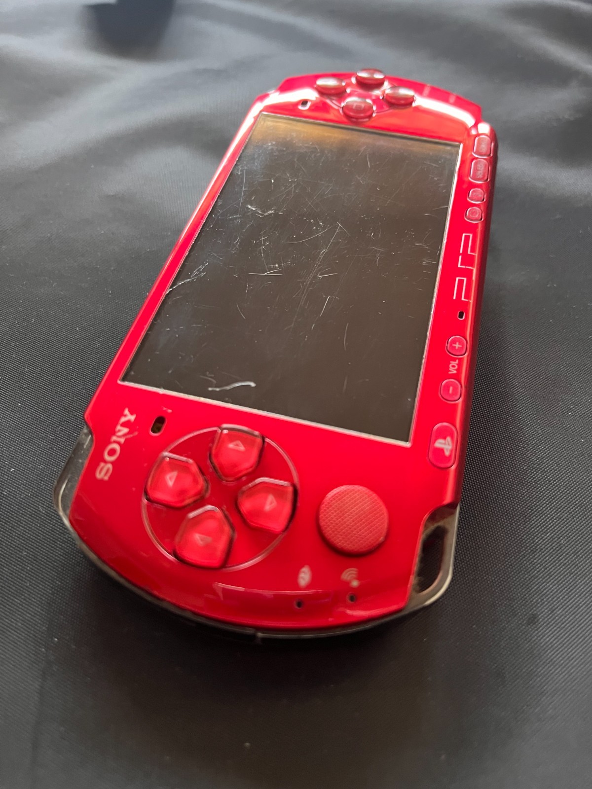 SONY PSP-3000 Radiant Red + AC charger + 8GB Memory – Working, Rank B