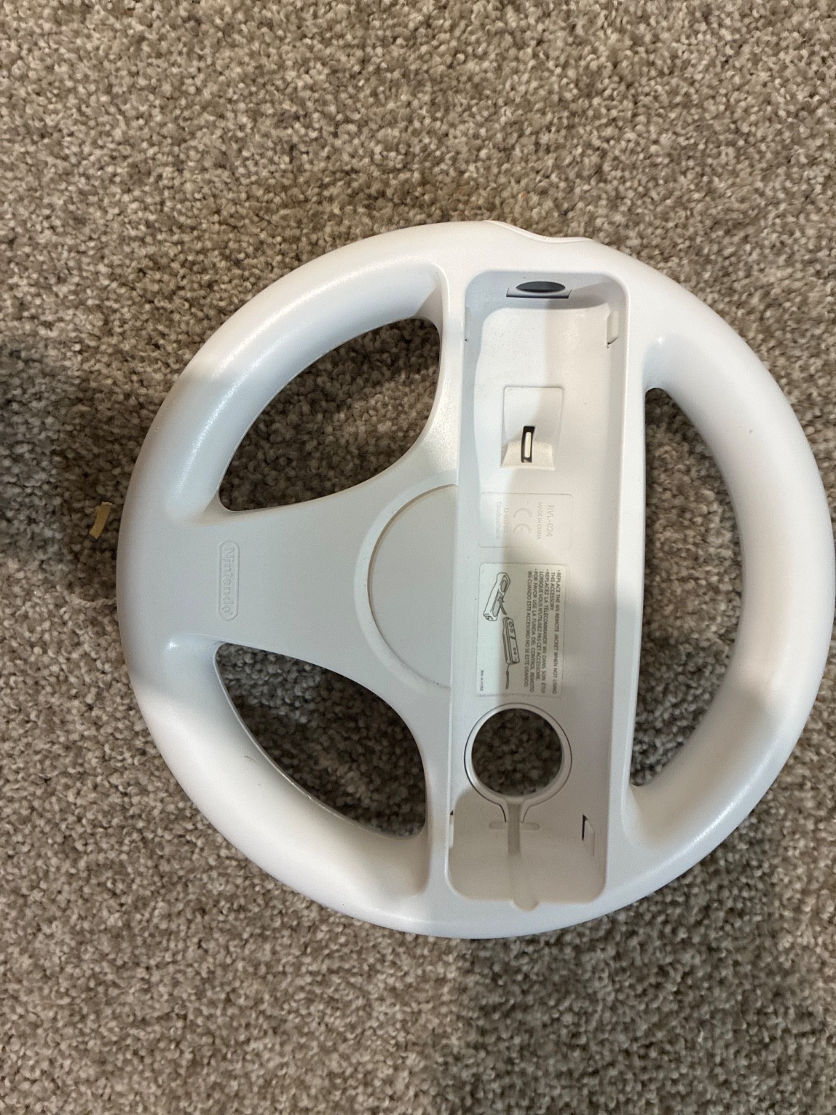Nintendo Wii console, three controllers, four nunchucks, Wii steering wheel