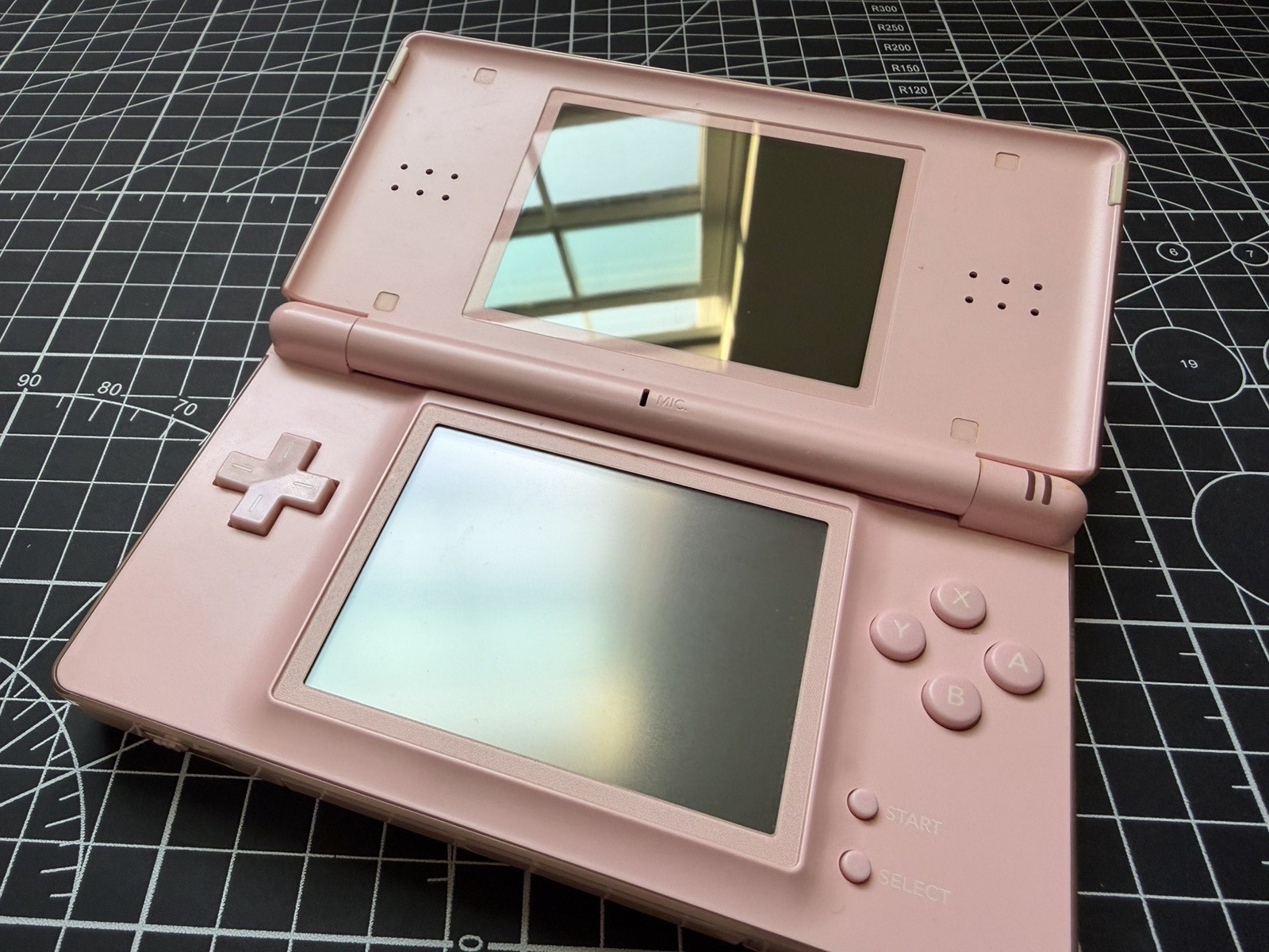 Nintendo DS Lite Used OEM Coral Pink W/ R4 & 2GB SD – 100% Tested Region Free