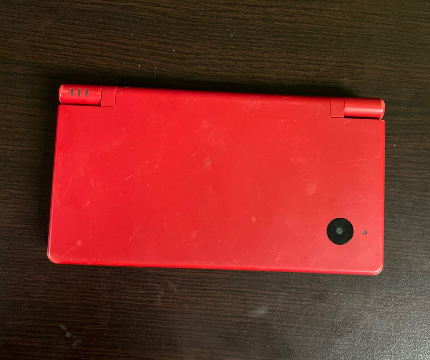 Nintendo DSi Red Console Only. Works. Used. Charger Not Included