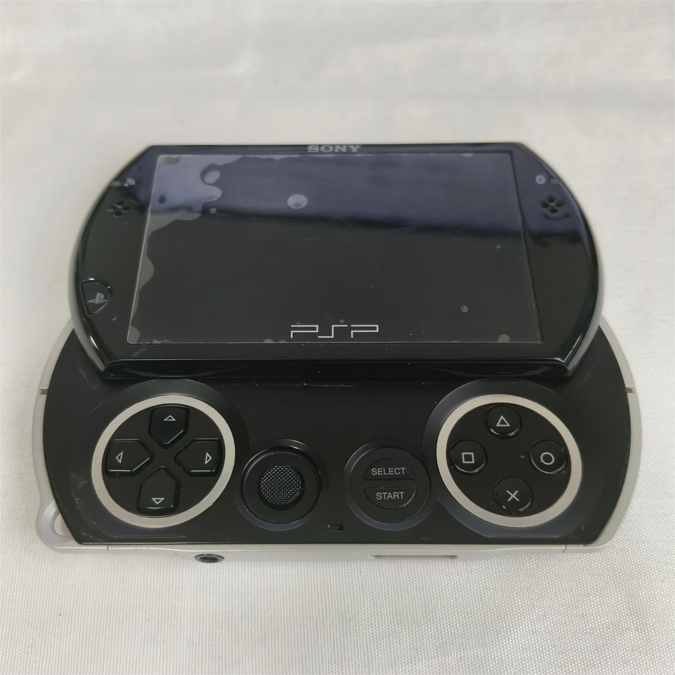 Sony PSP GO console Black with Charger PSP-N1003 Screen with protect
