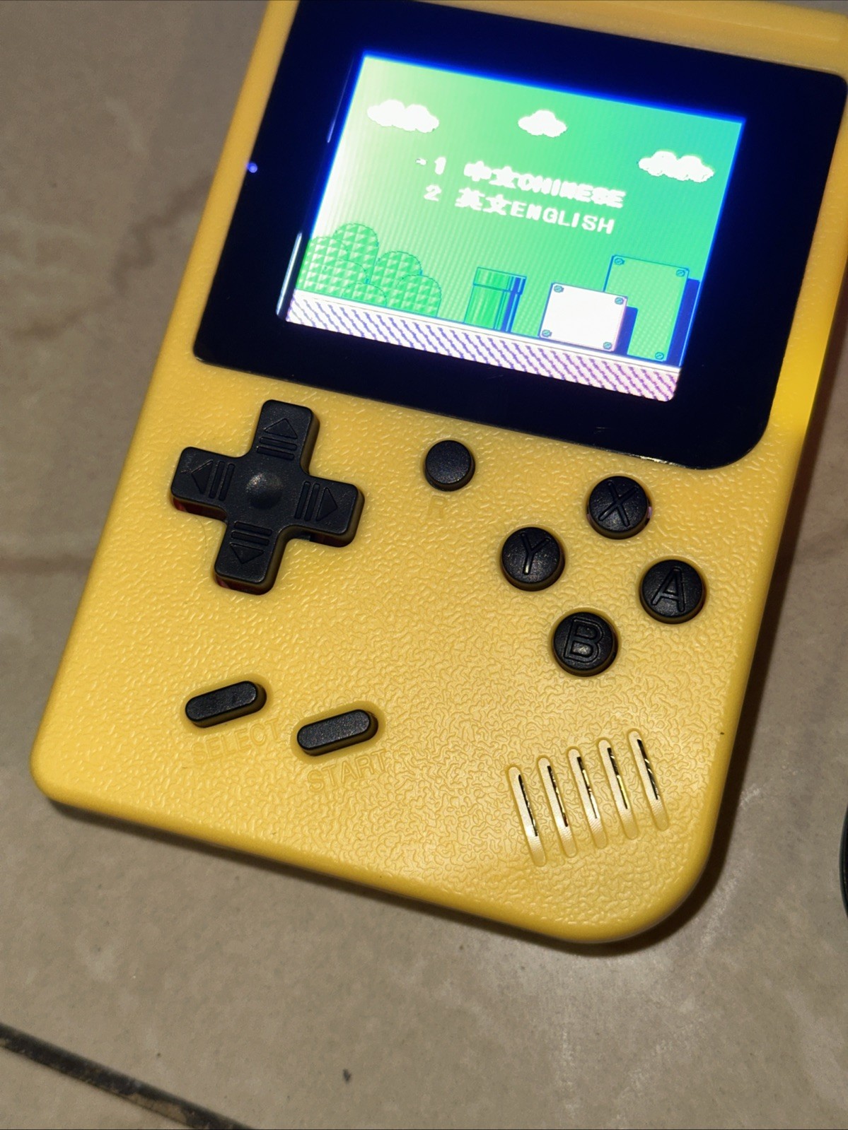 GAME BOX PLUS–RECHARGEABLE GAME SYSTEM—YELLOW
