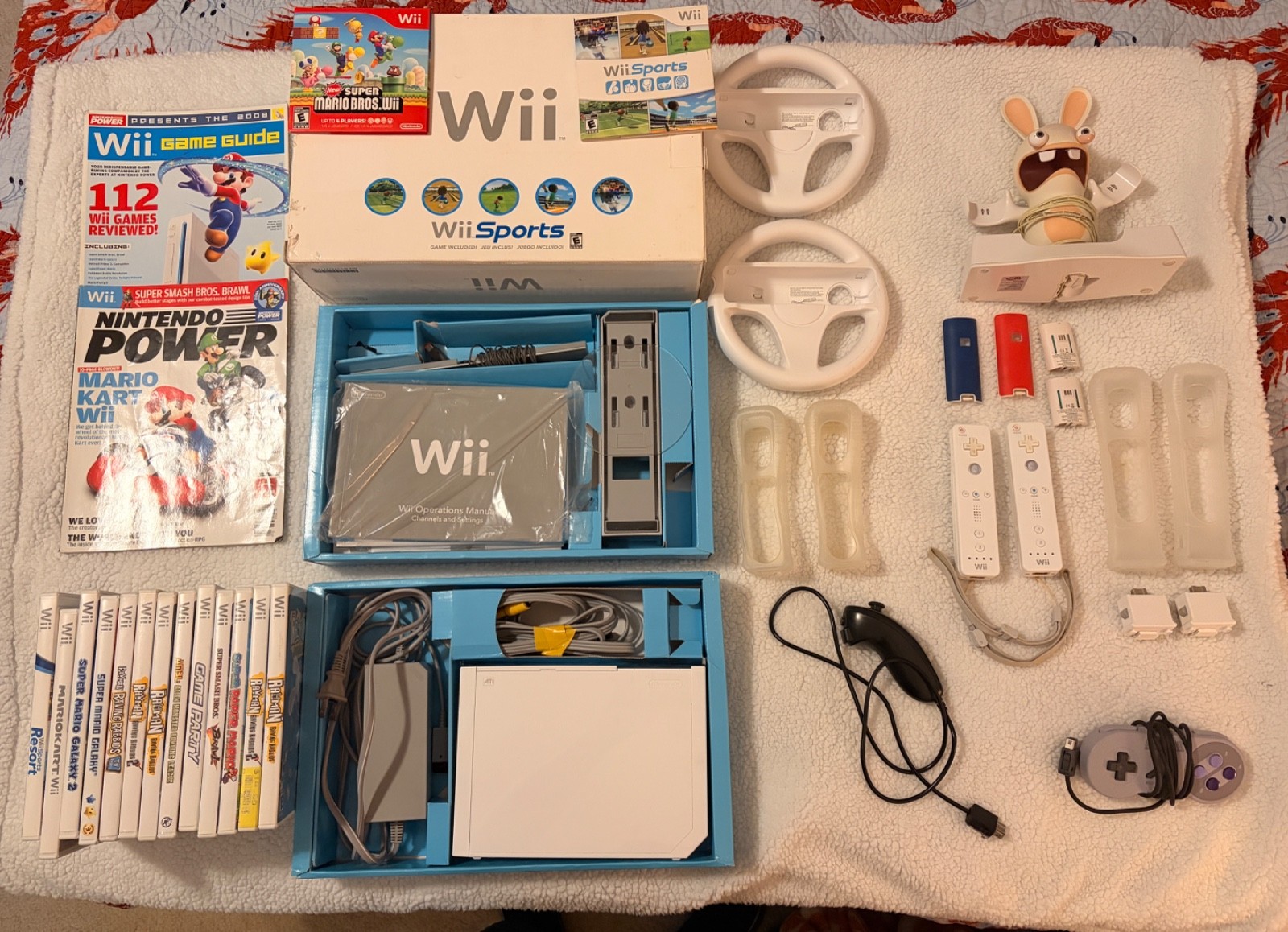 Nintendo wii with box and instructions, 15 games, rabbids charger plus more