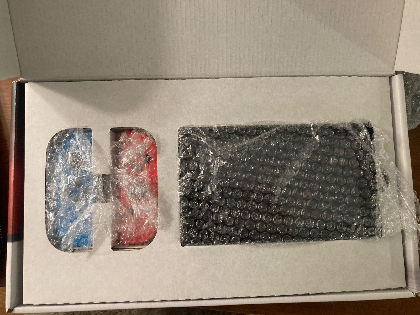 Nintendo Switch 32GB Gray Console with Neon Red and Neon Blue Joy-Con