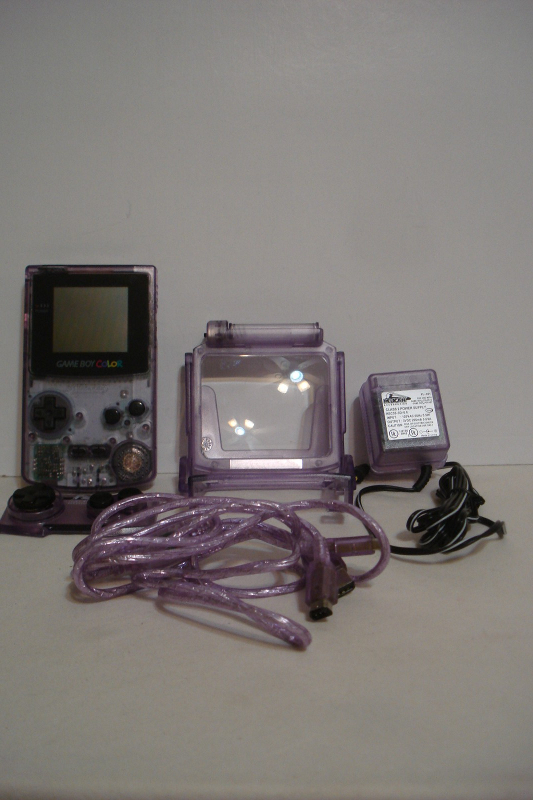 Nintendo Game Boy Color System Clear Atomic Purple w/ Pelican Accessories