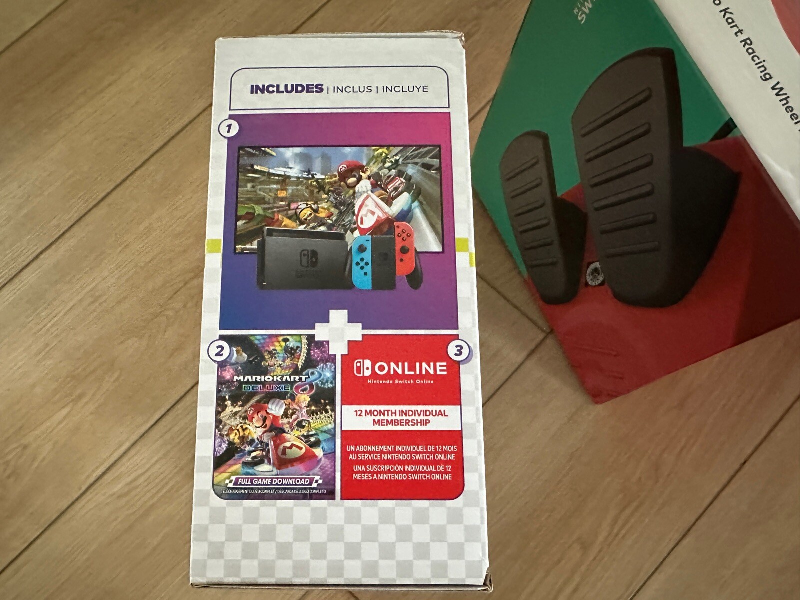 Nintendo Switch Mario Kart 8 Console Bundle with Hori Steering Wheel