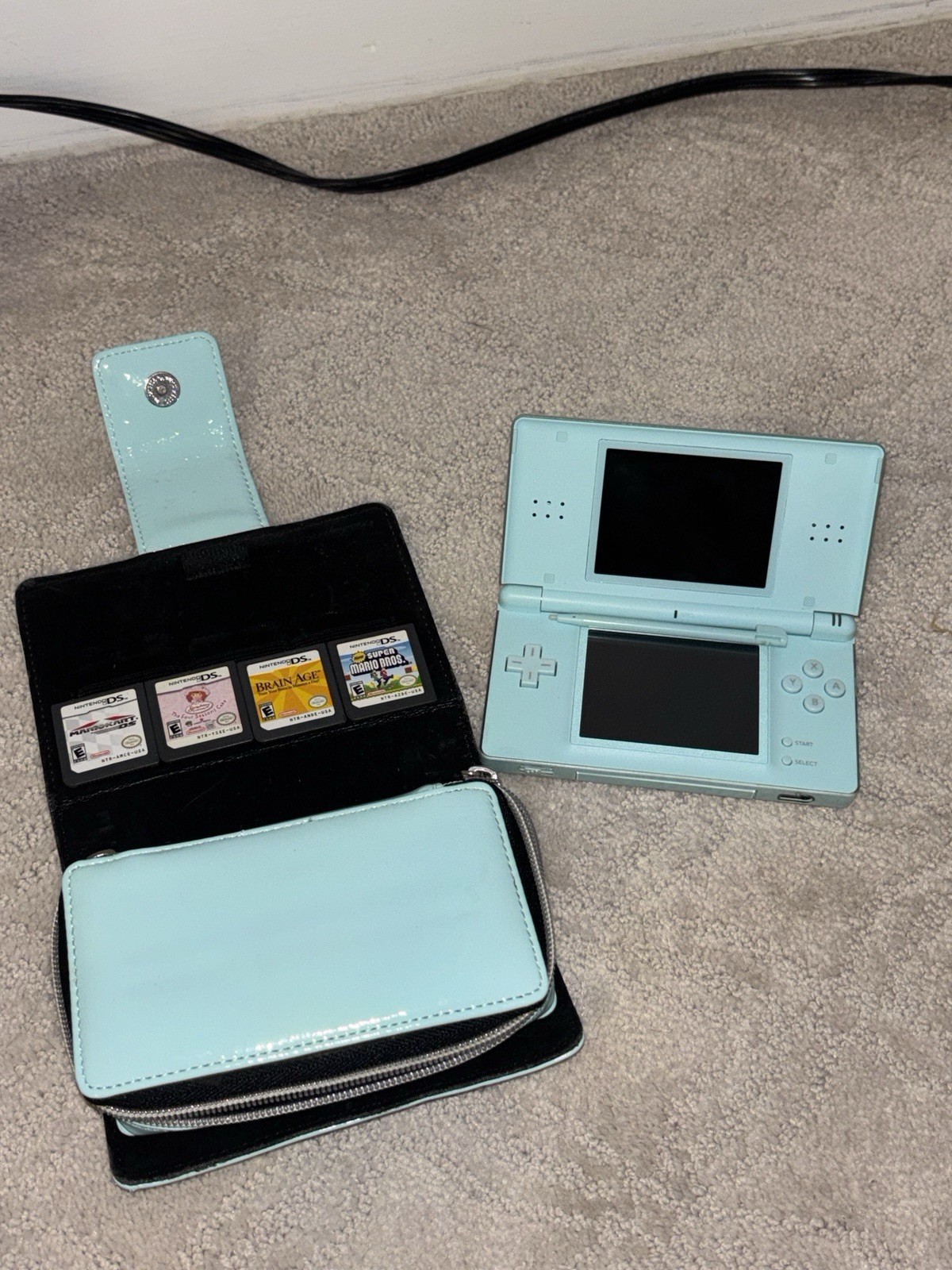 LIMITED EDITION BRAIN AGE DS with 4 DS games- charger not included
