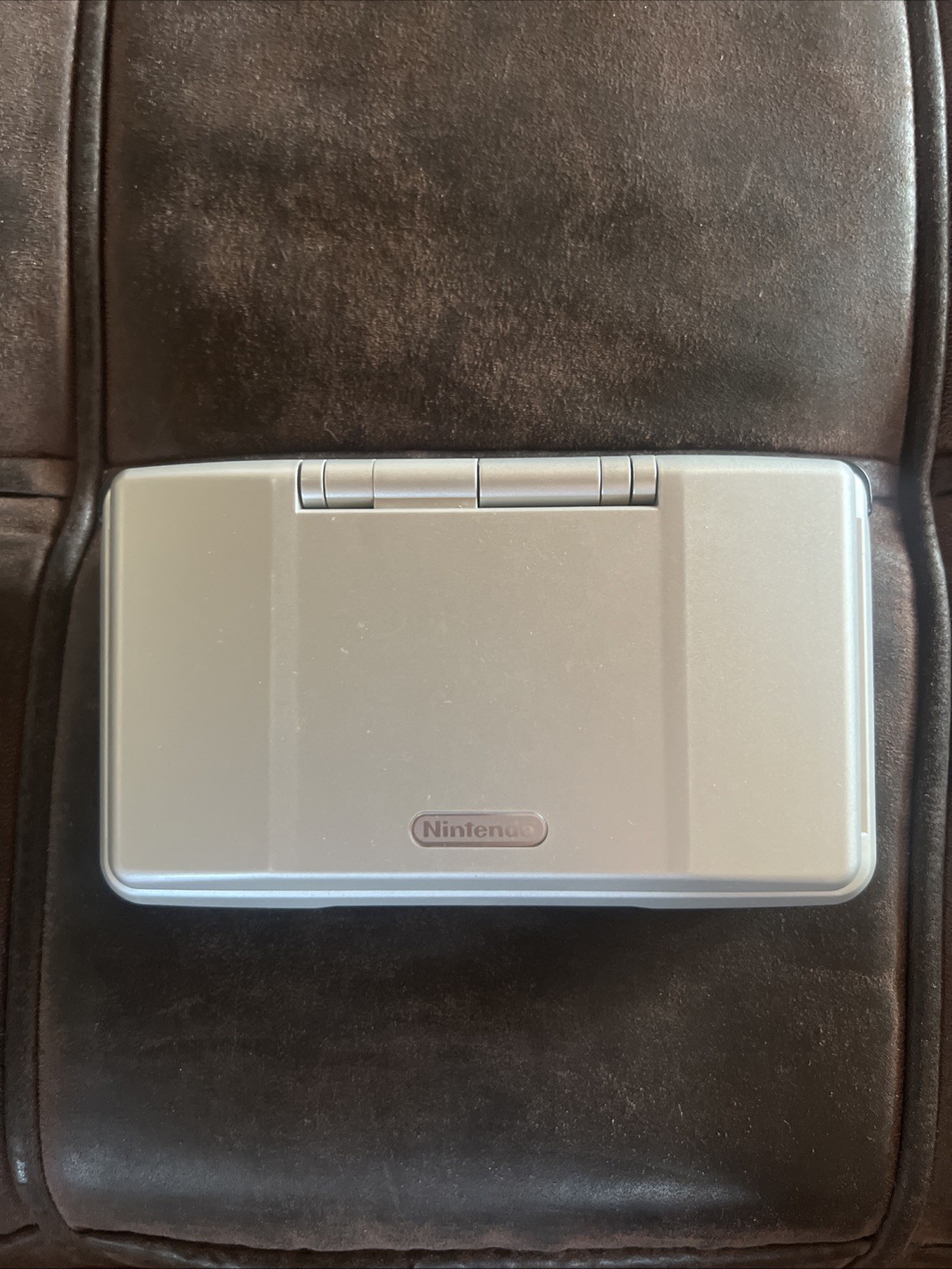 Titanium silver Original Nintendo DS with charger and stylus