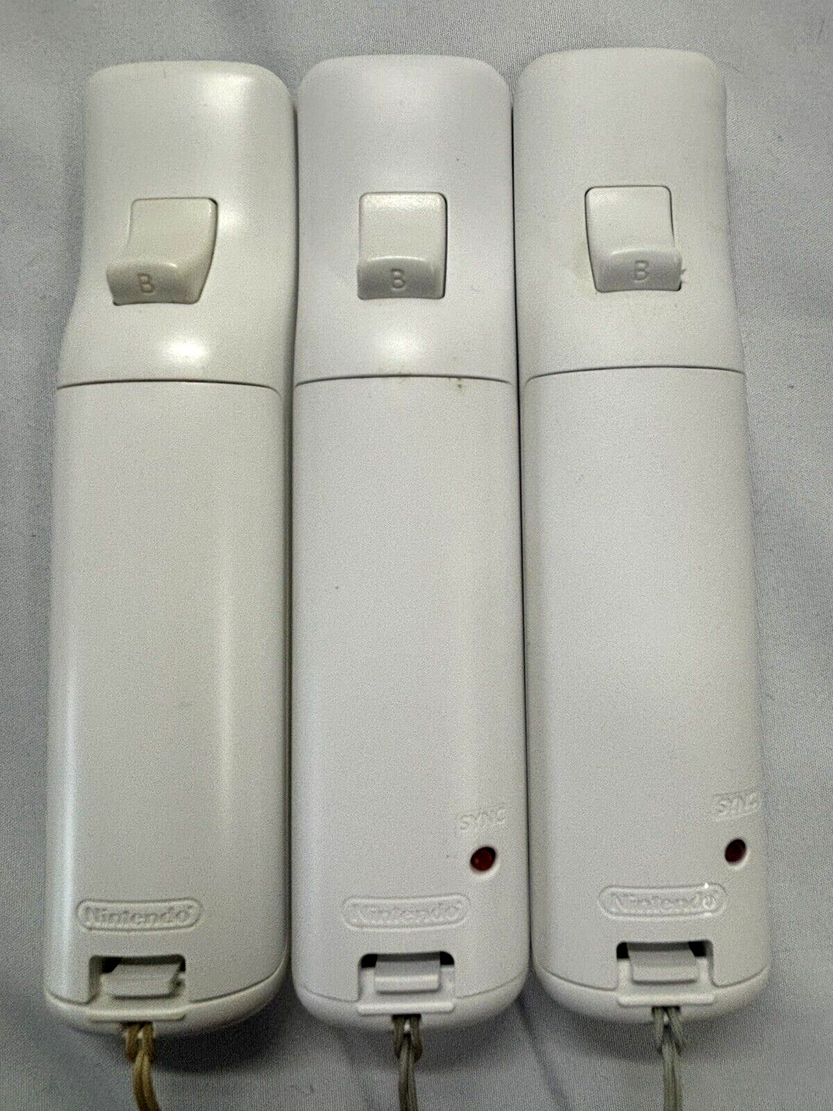 Nintendo Wii game console + balance board 3 remotes, 2 nunchuks 13 software
