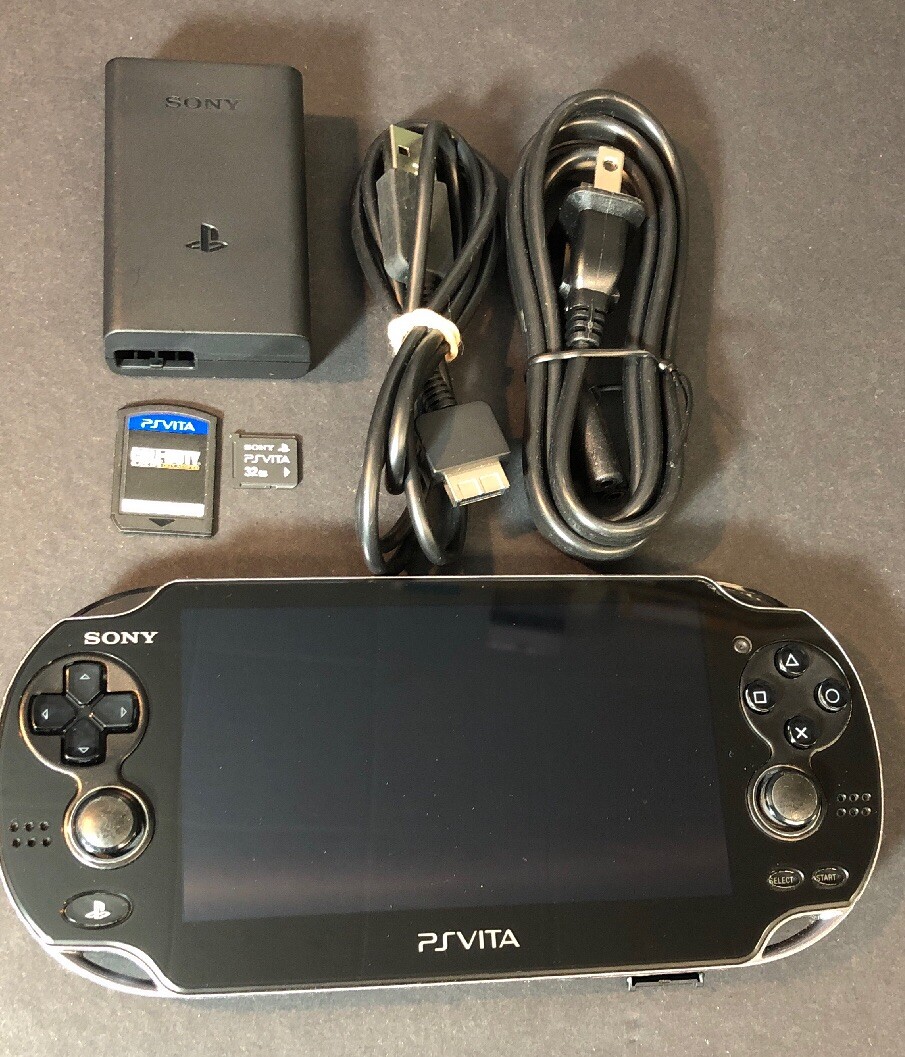 Sony PS VITA WiFi + 3G Bundle [ 32GB Memory + COD Black Ops Declassfied ] USED