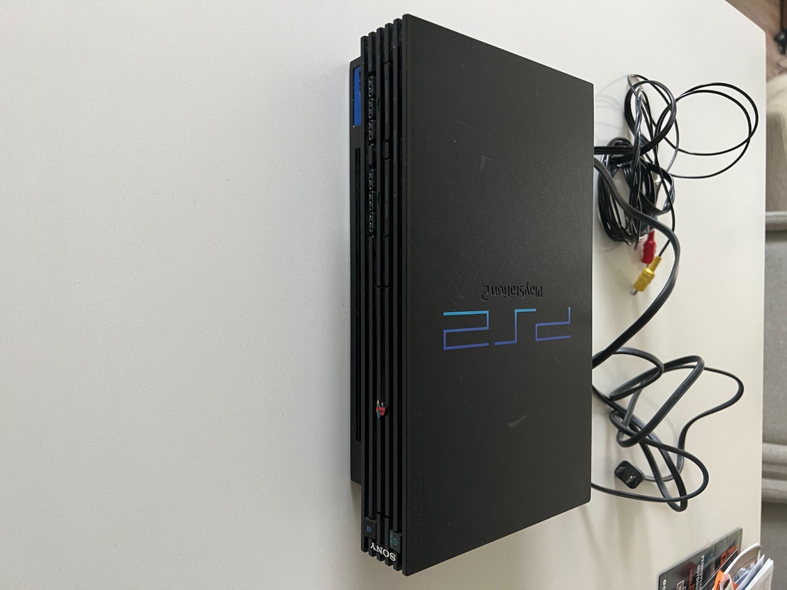 PlayStation 2 console bundle (2 controllers, 2 games, & 3 8mb memory cards)