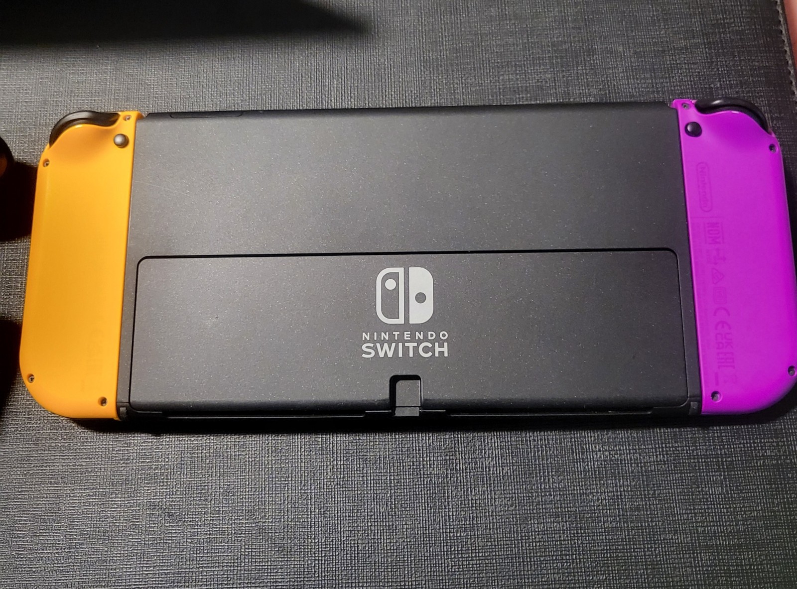 Nintendo Switch OLED Model – White – Orange Purple Joycons + 64gb Sandisk