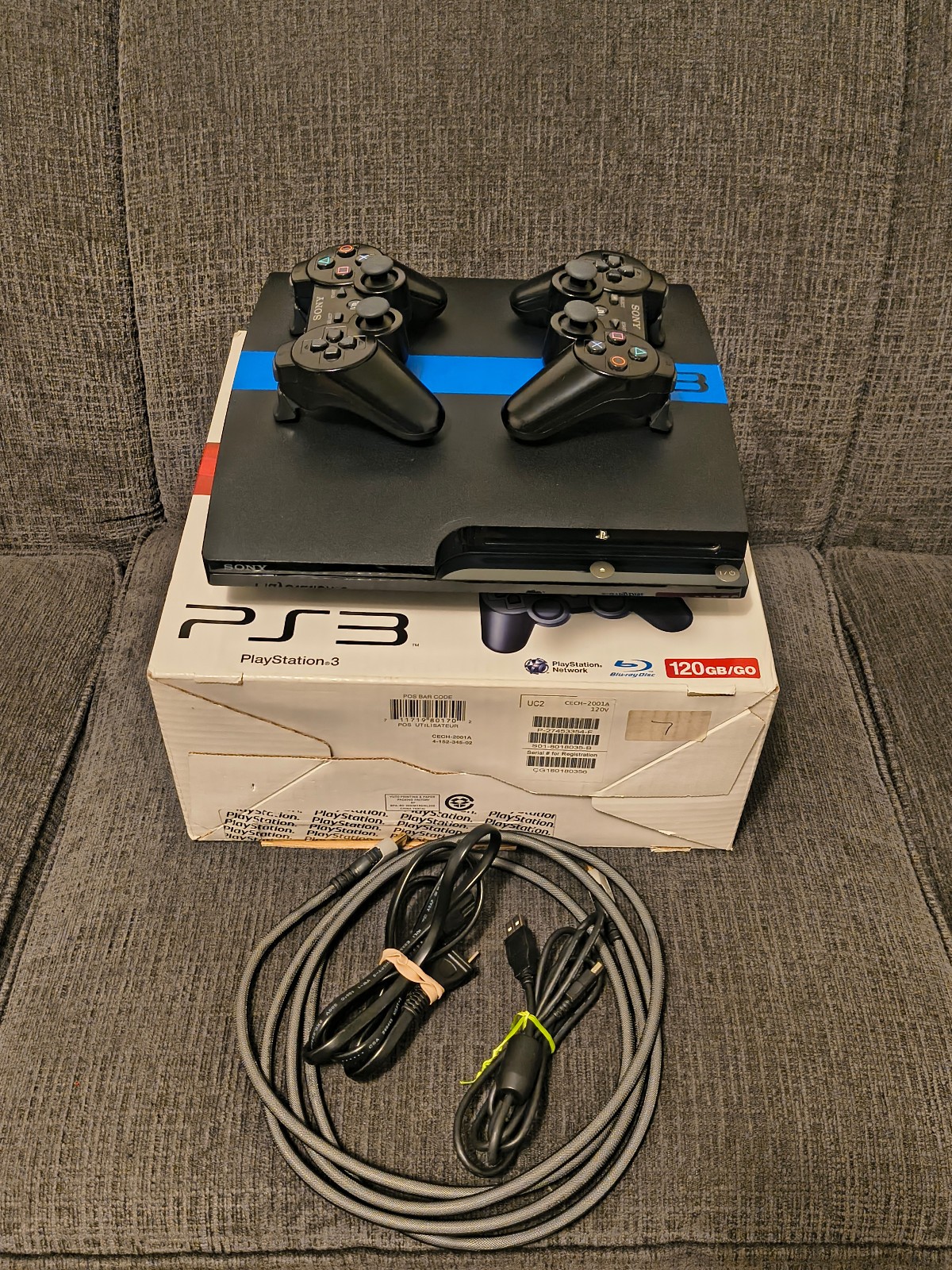 Sony PlayStation 3 Slim 120GB Console Bundle – 8 games, 2 controllers, cables