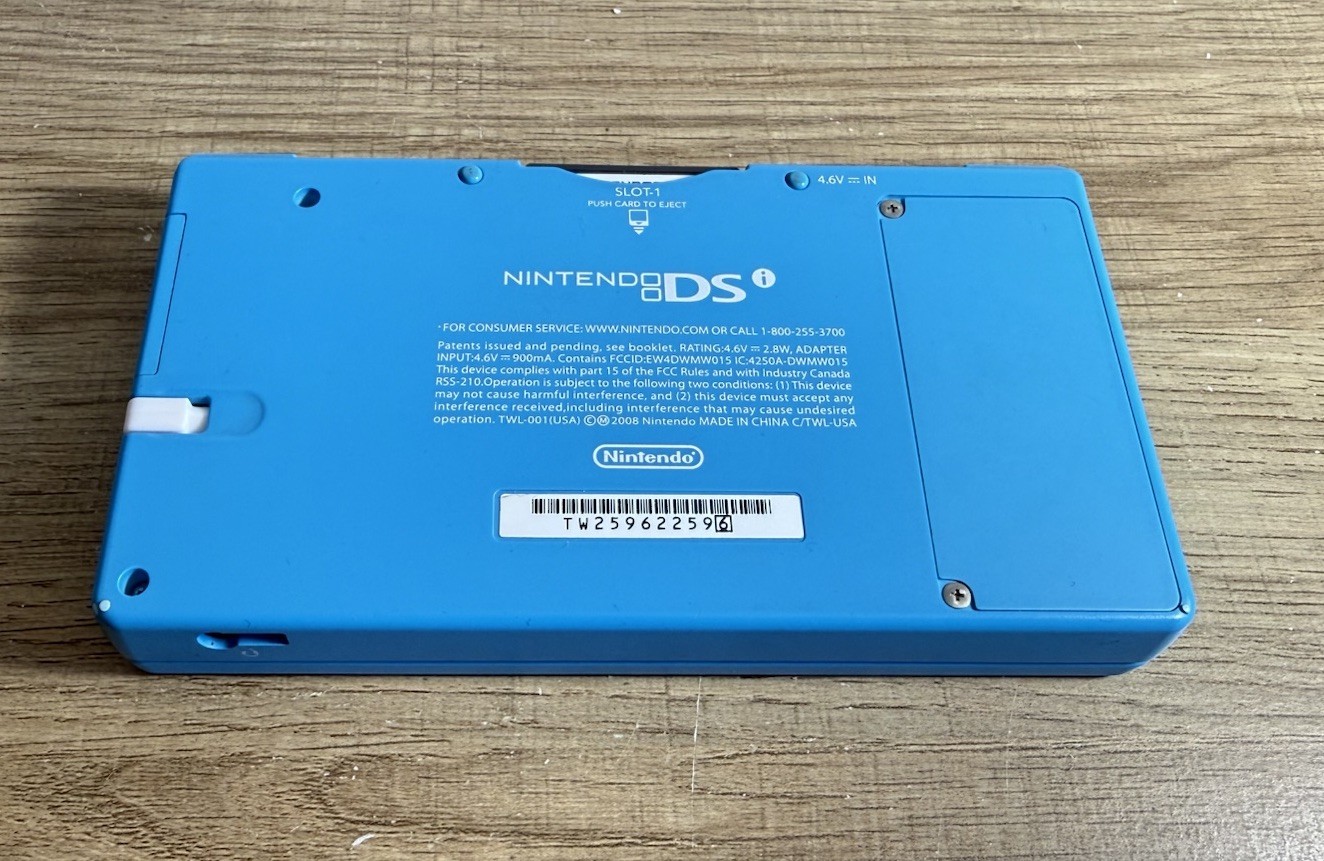 Nintendo DSi Aqua Blue Handheld Console w/ Stylus Iron Man2 Charger Tested Works