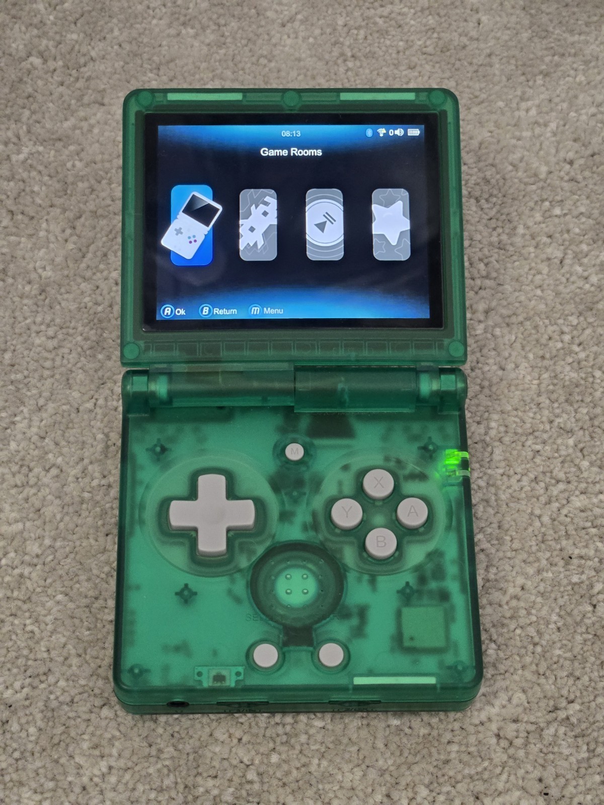 Anbernic game console RG35XXSP retro handheld transparent green tested arcade