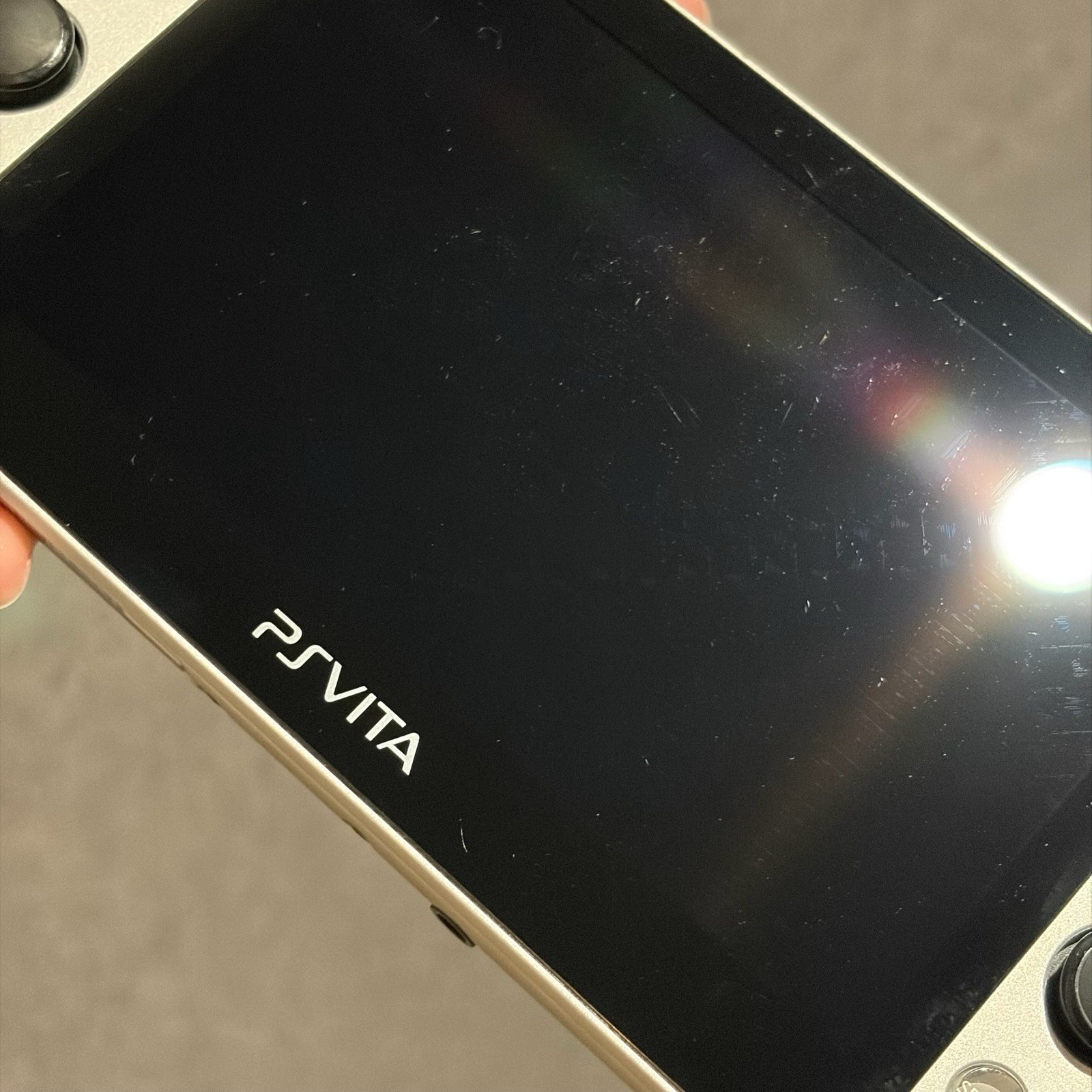 SONY PS Vita PCH-2000 Console Silver Very Good Fast Shipping No joystick drift.