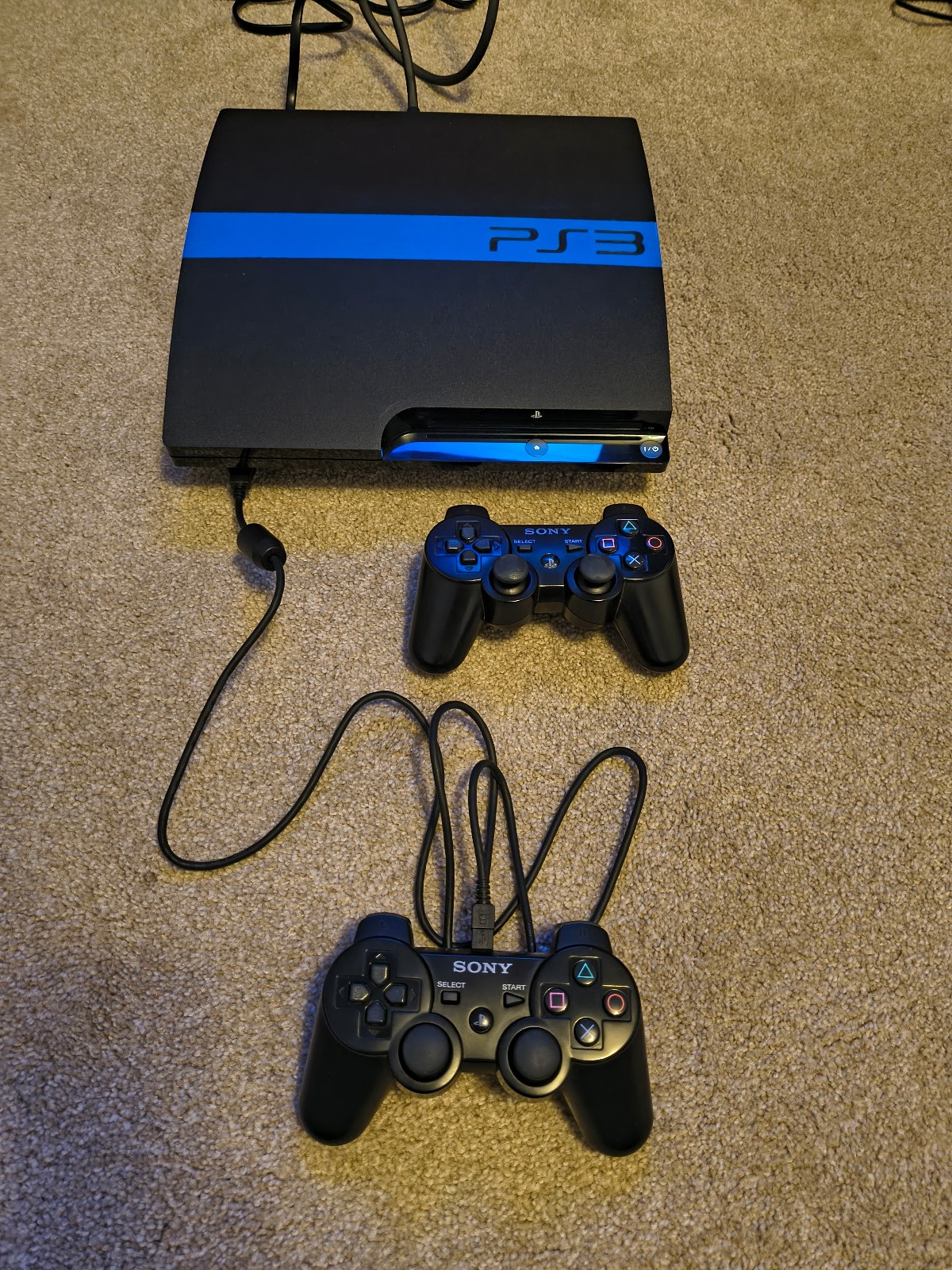 Sony PlayStation 3 Slim 120GB Console Bundle – 8 games, 2 controllers, cables