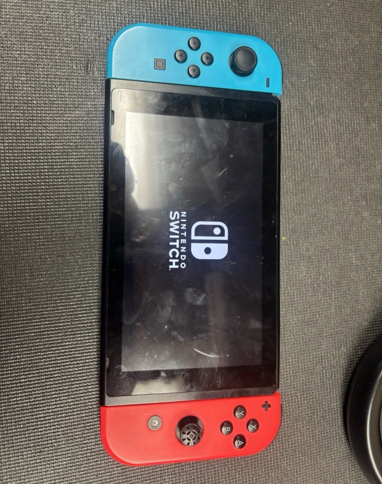 Nintendo Switch HAC-001(-01) 32GB 720p w/ Neon Blue/Red Joy-Con & Grip