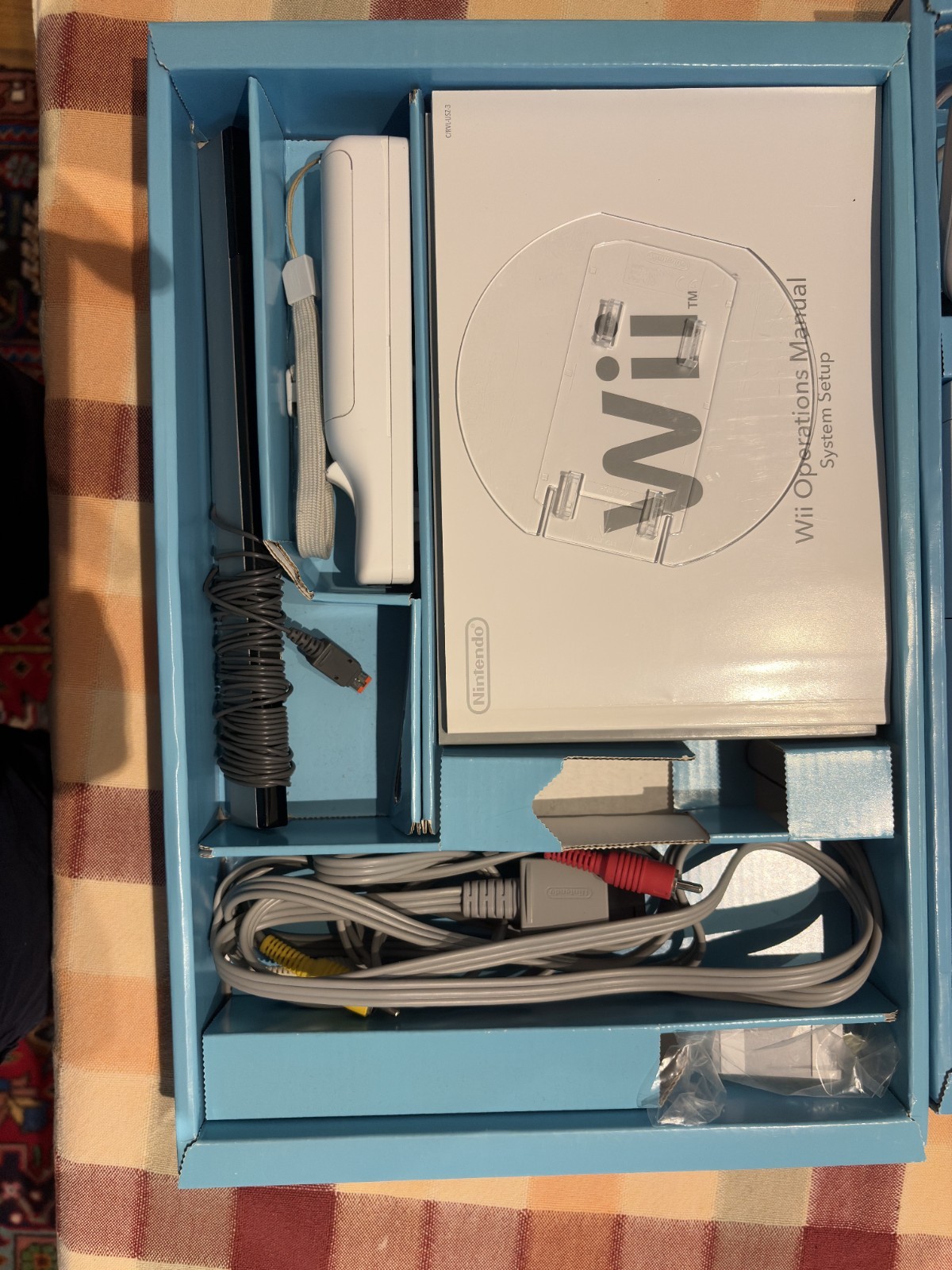 Nintendo Wii with assortment of games bundle – Original Packaging included